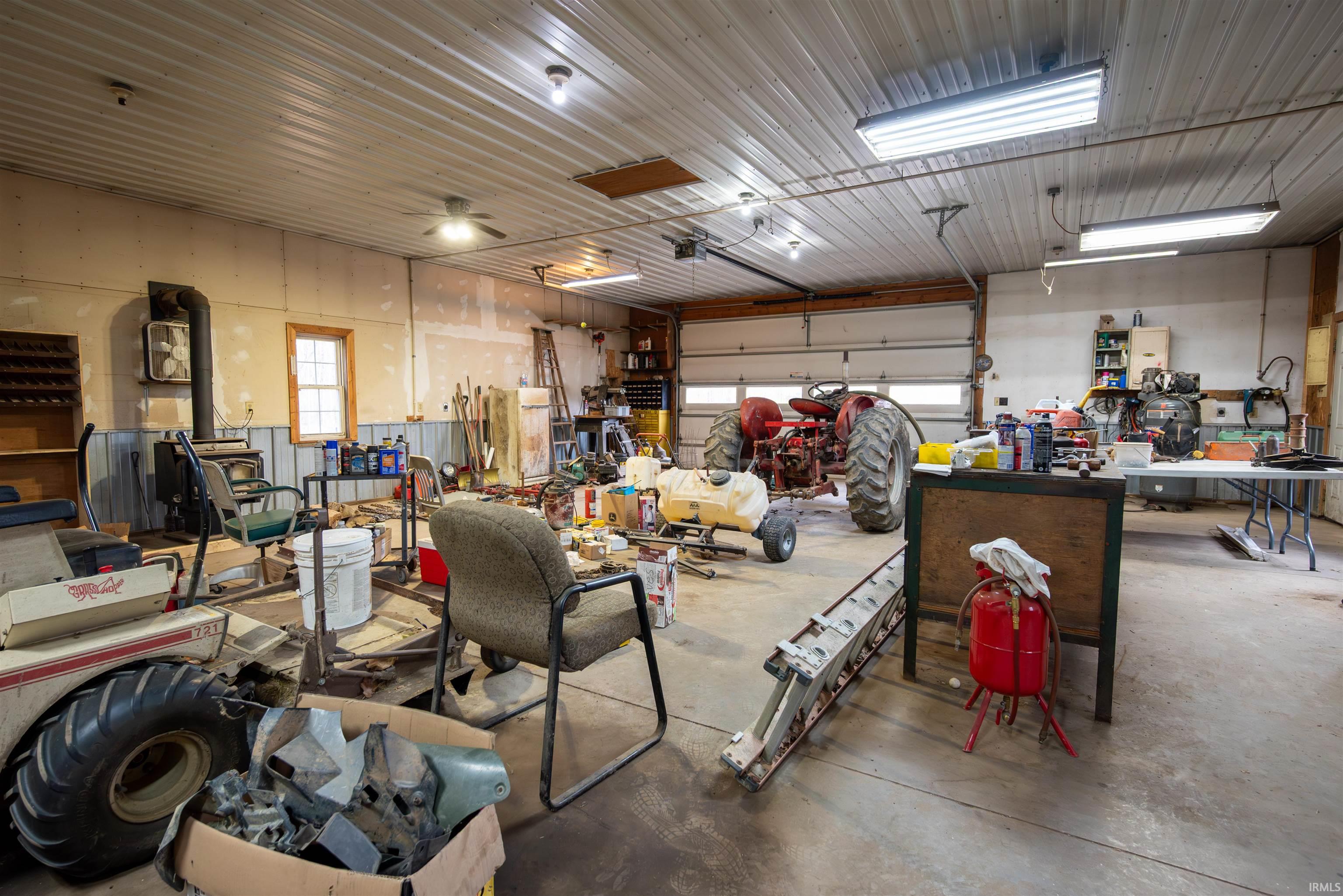 Garage featuring a workshop area