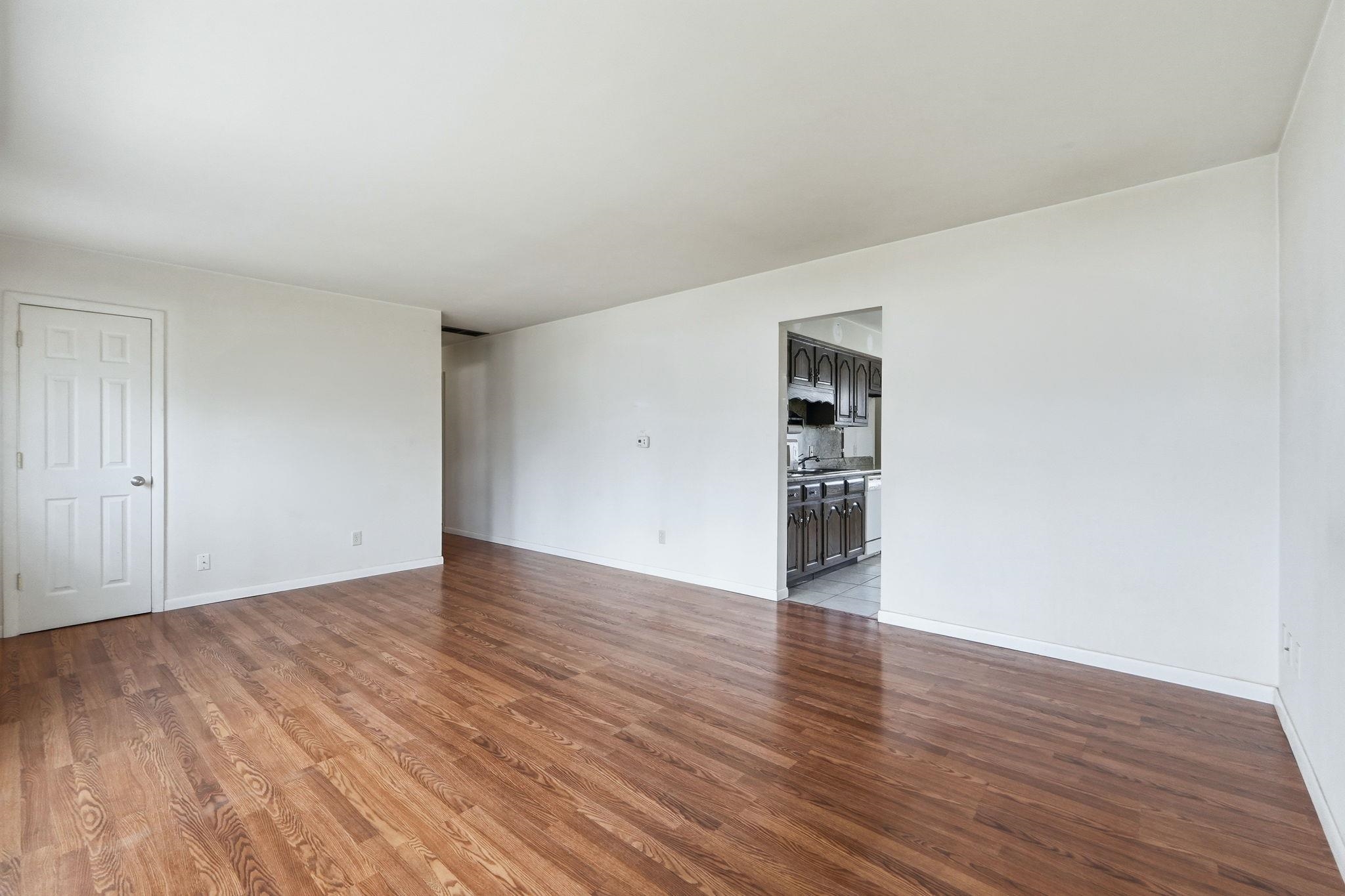 Spare room with light wood-style flooring