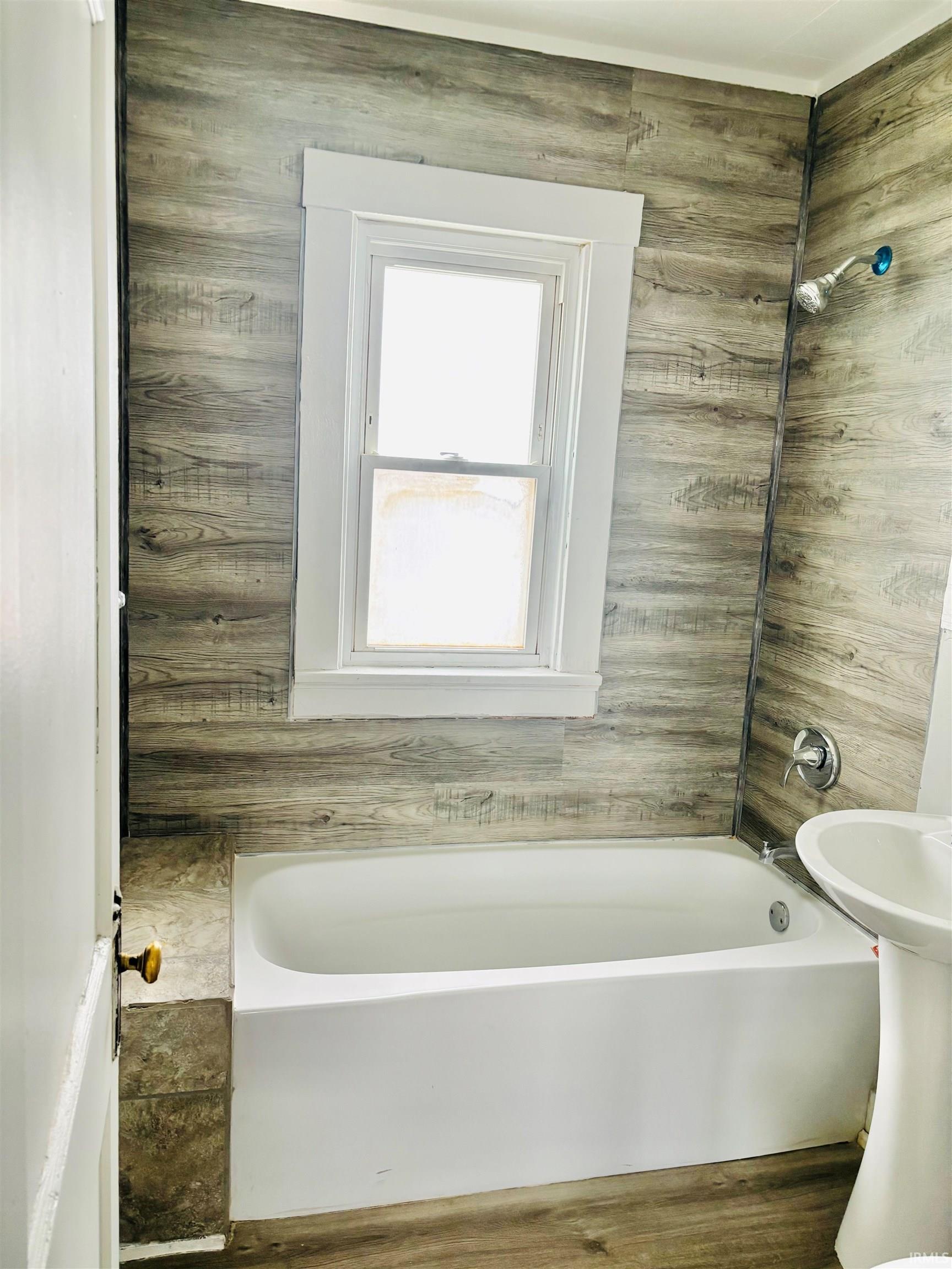 Full bath with shower / bathtub combination
