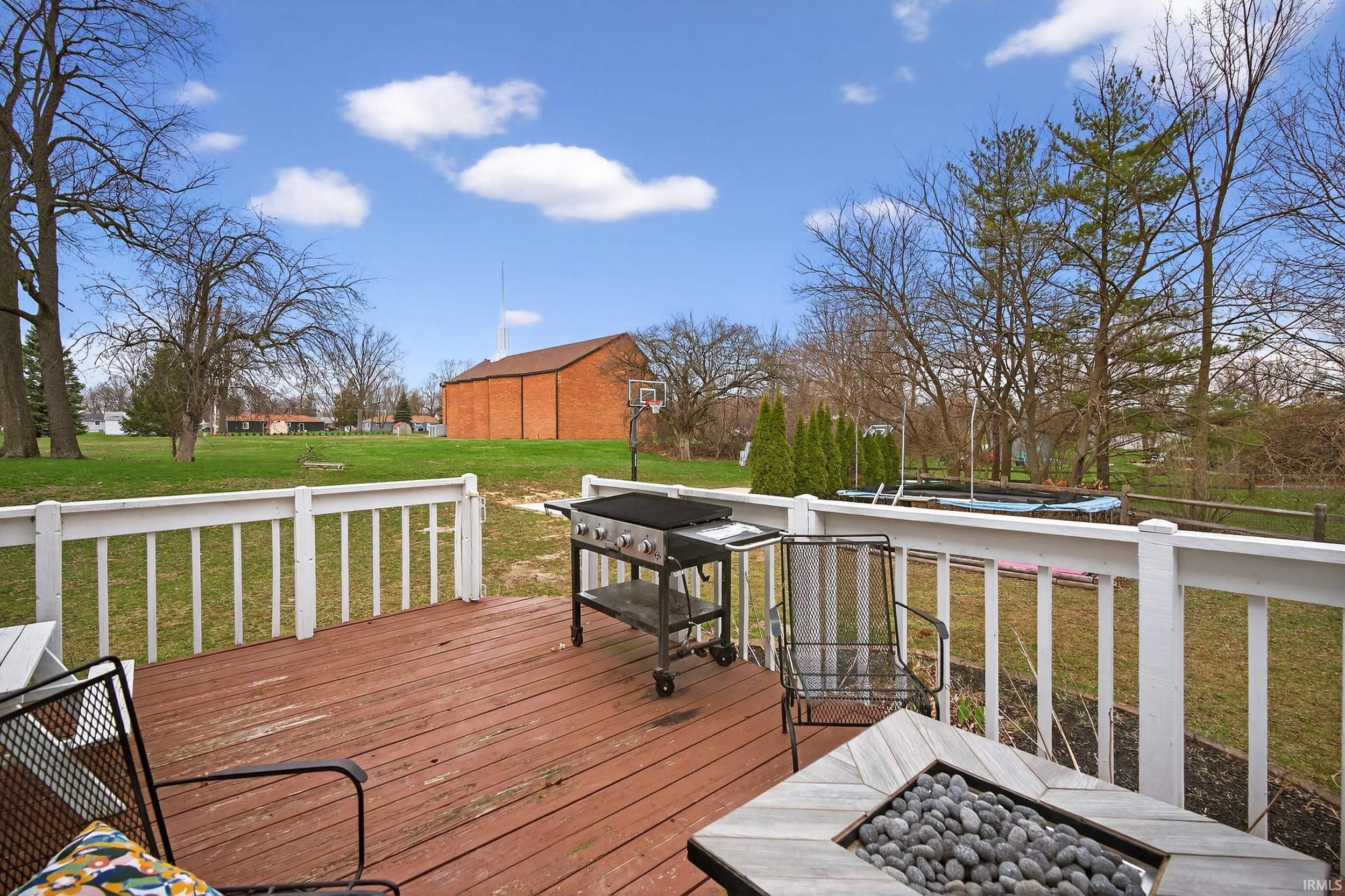 Wooden deck with a lawn