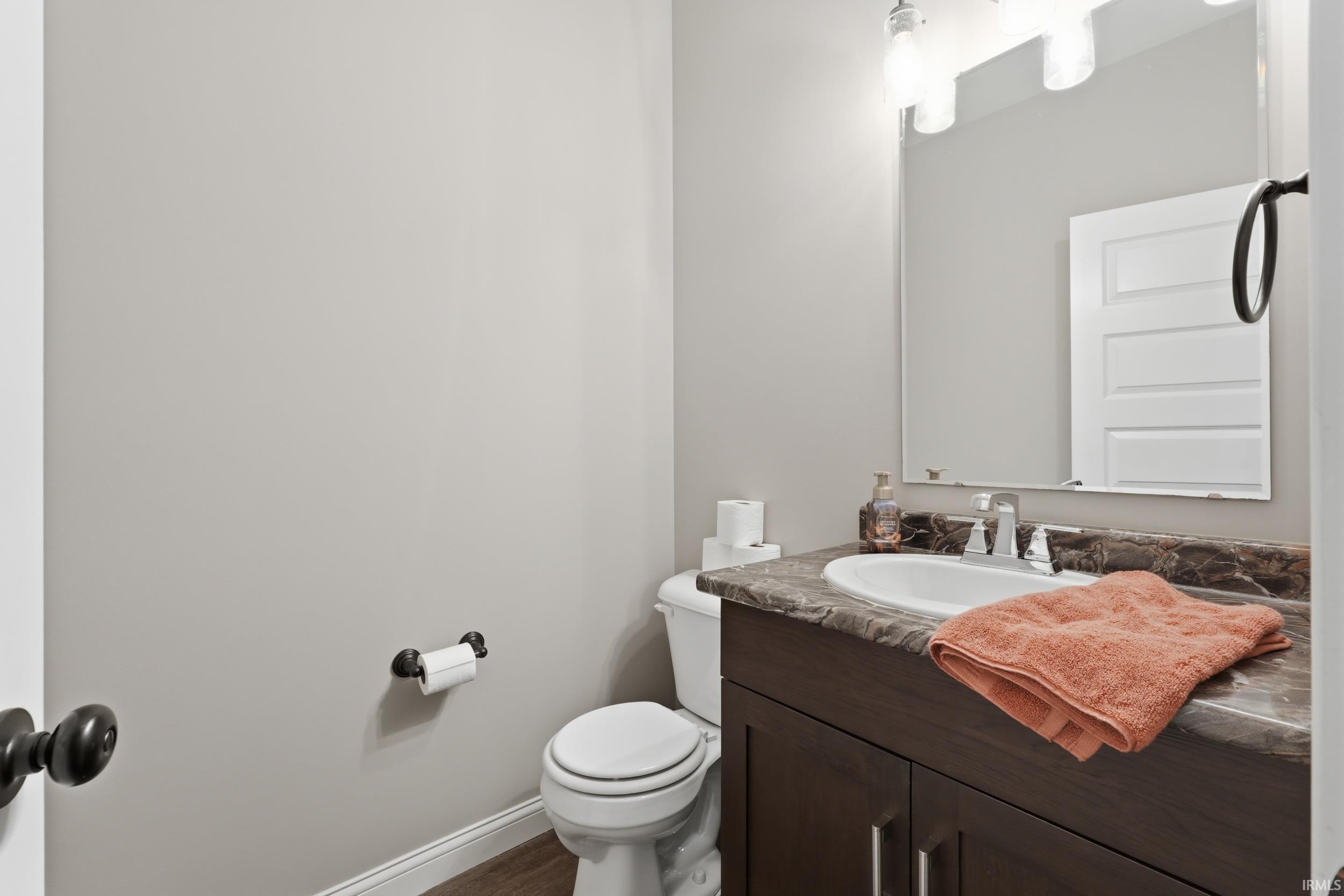 Bathroom with vanity and toilet