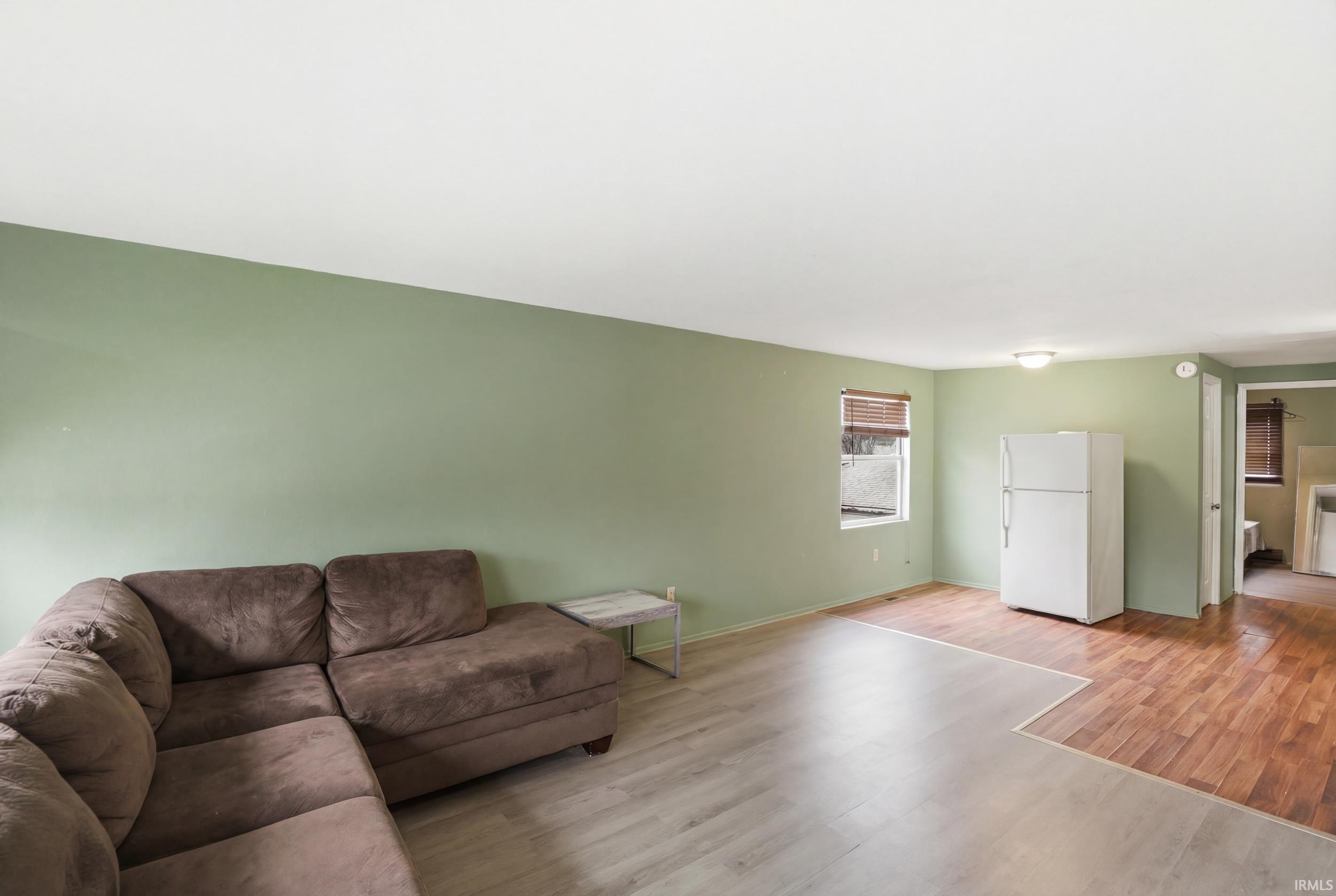 Living area featuring light wood-type flooring