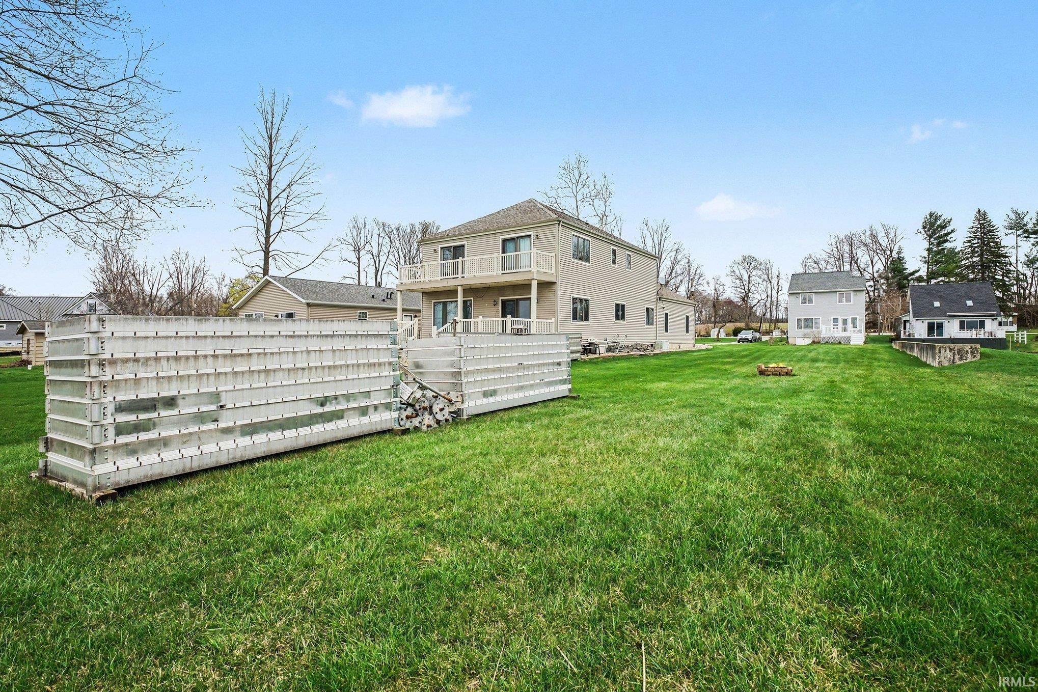 View of green lawn and pier