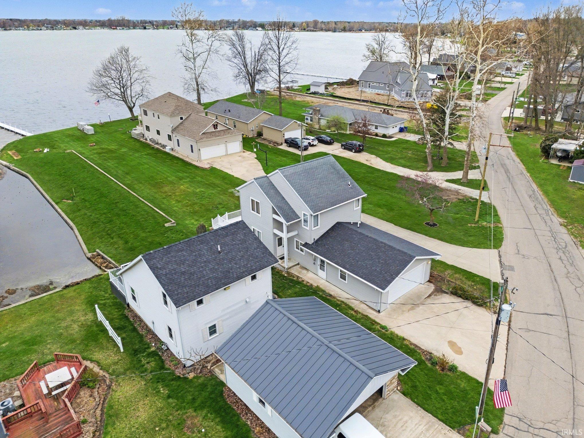 Aerial view of residential area with a nearby body of water