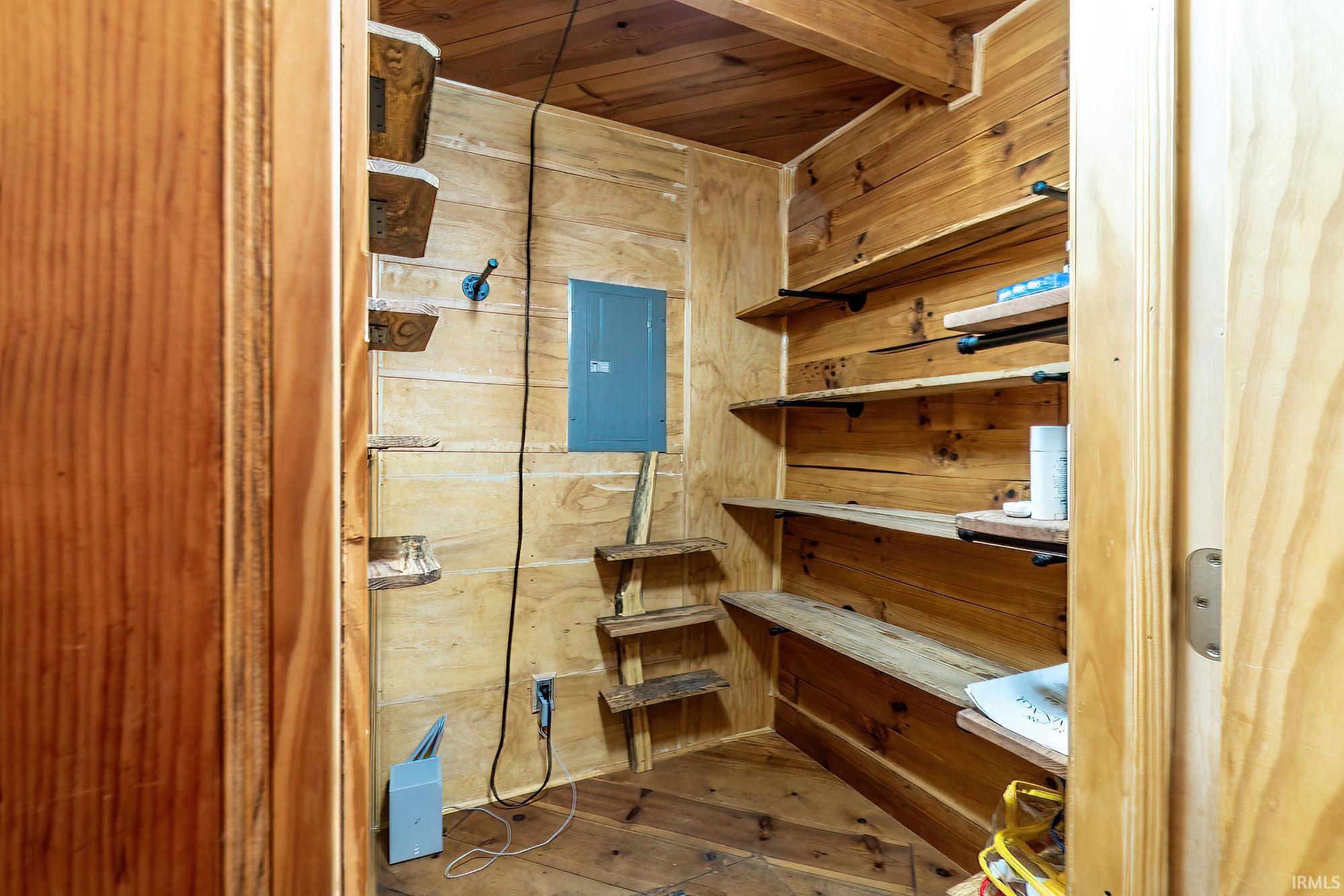 Storage area featuring electric panel