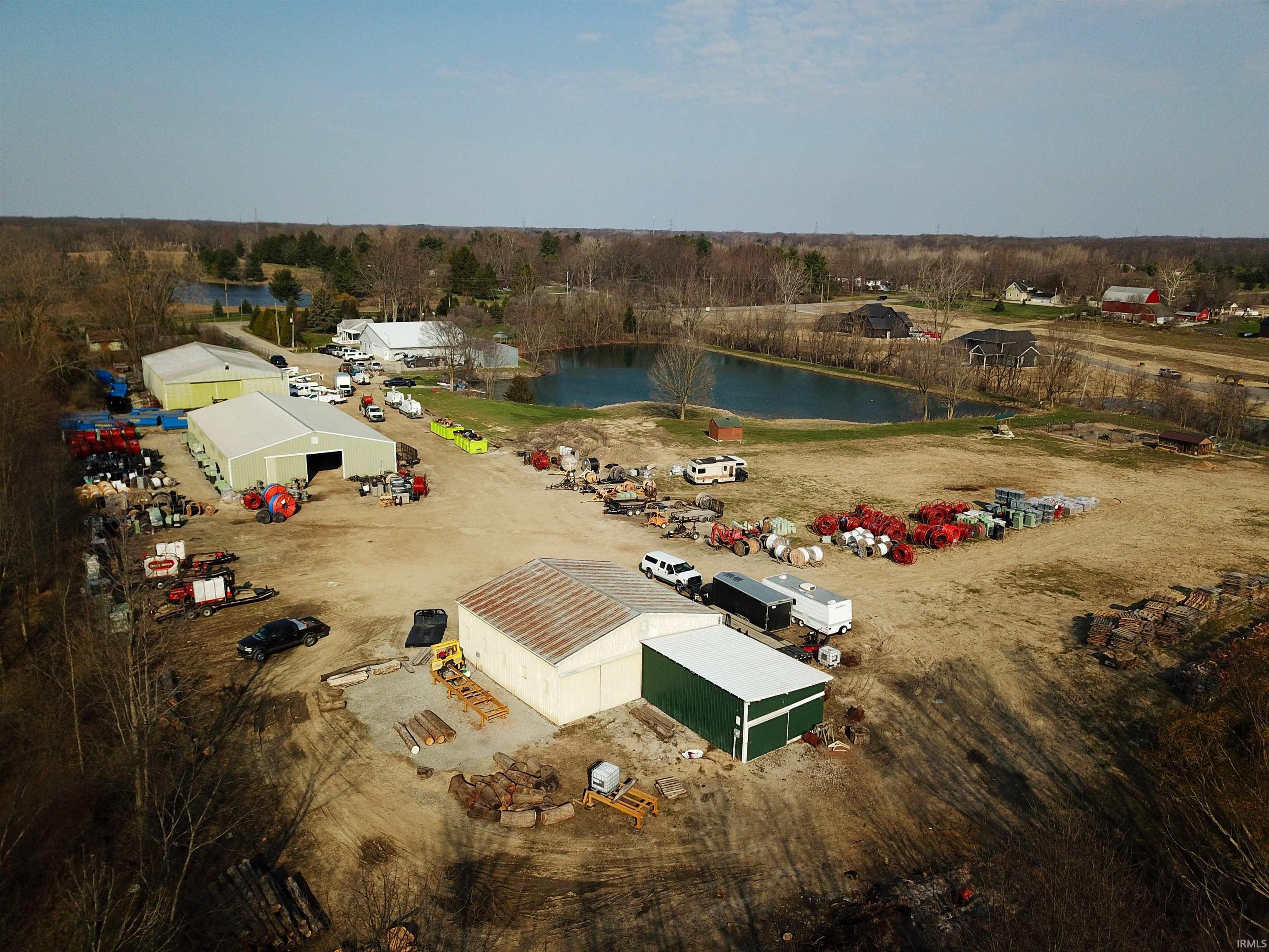Aerial overview of property's location featuring a nearby body of water