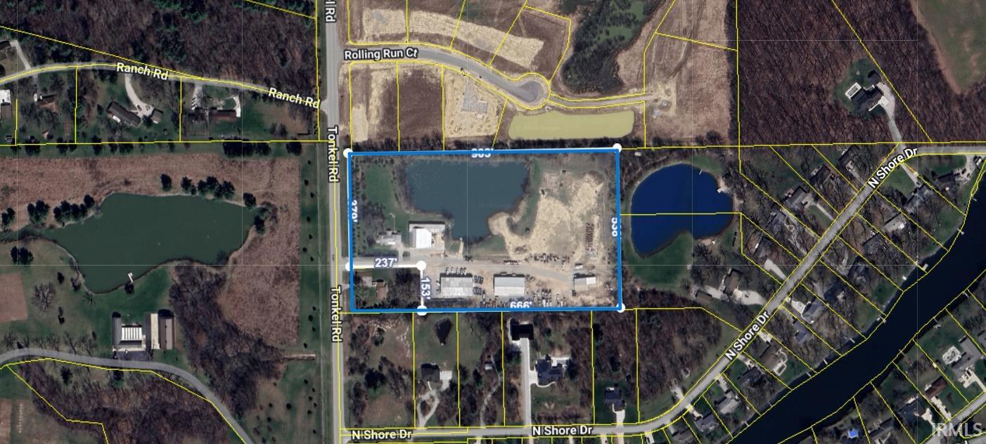 Aerial view of property's location featuring property parcel outlined