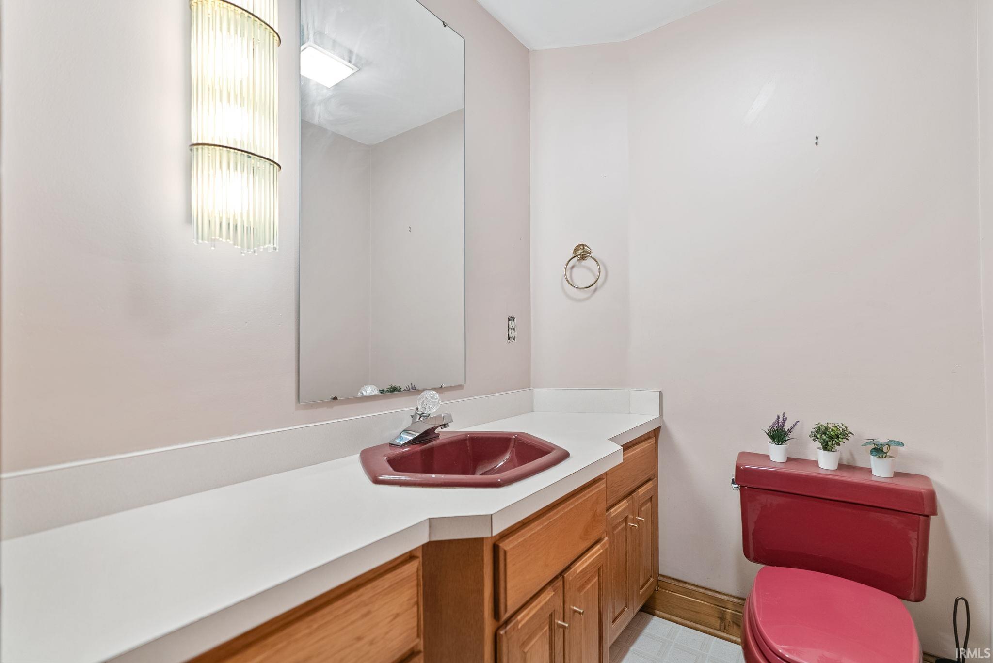 Bathroom featuring toilet and vanity