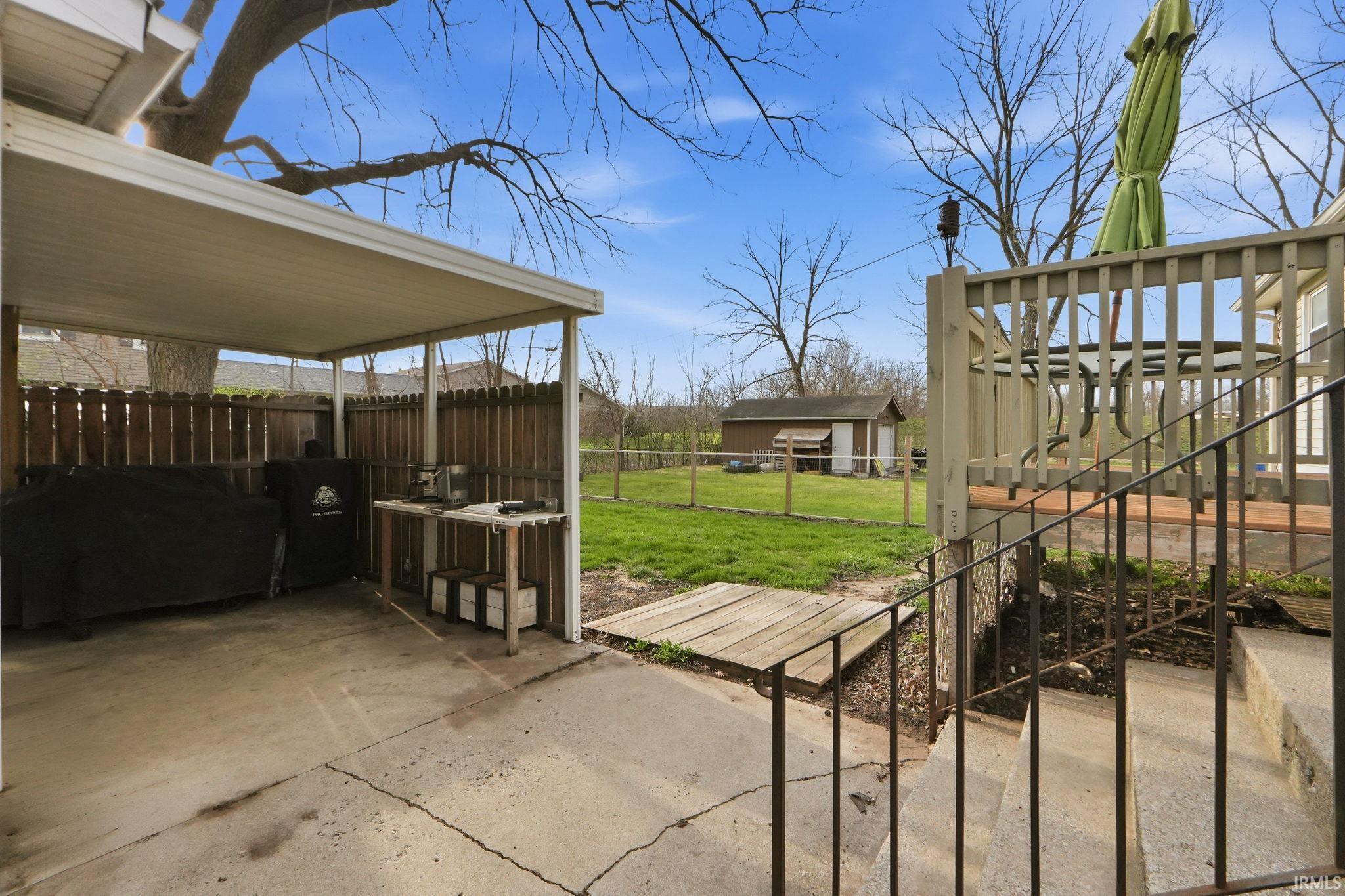Fenced backyard featuring a patio area
