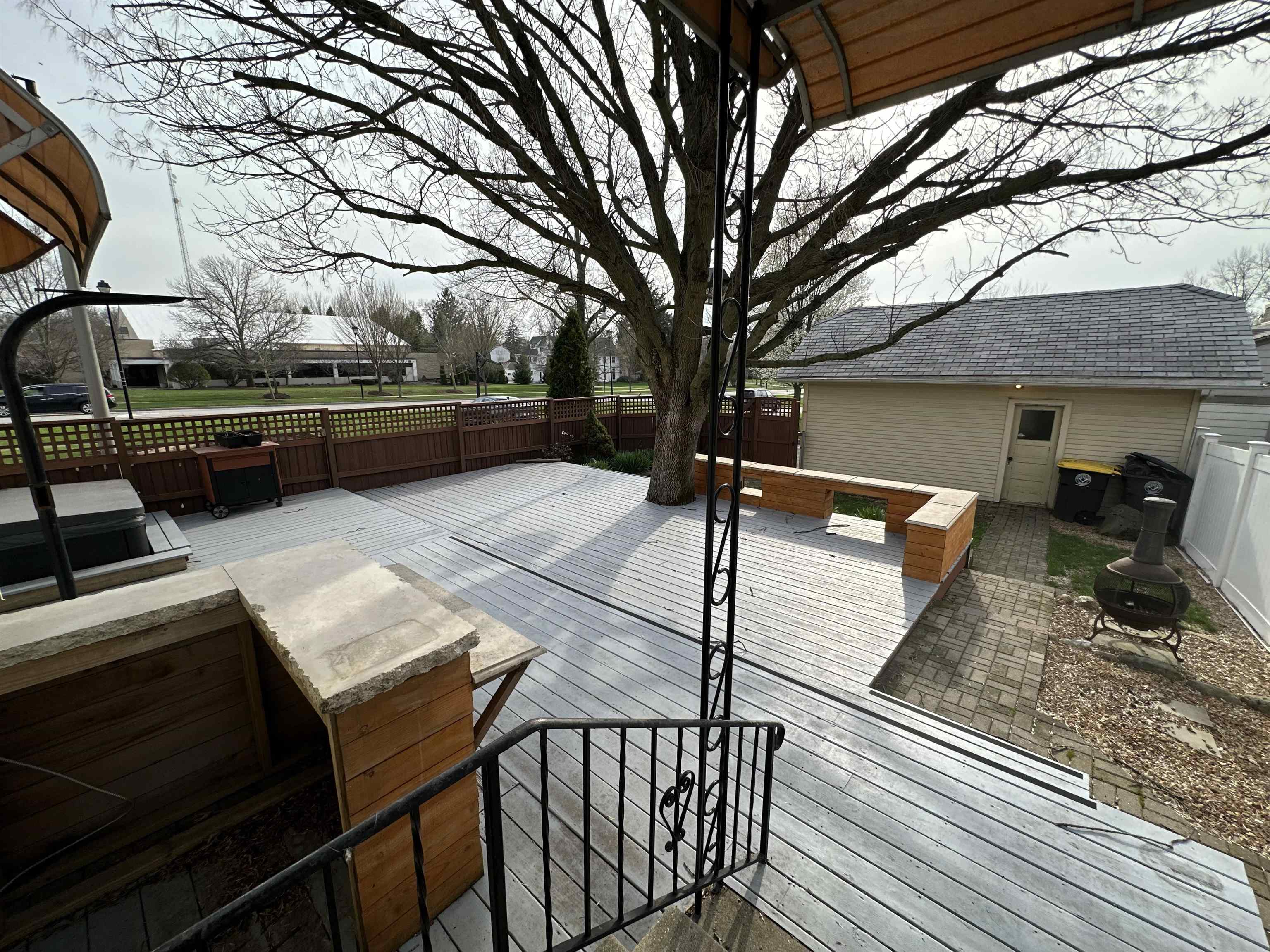 Deck featuring a patio area and a fenced backyard