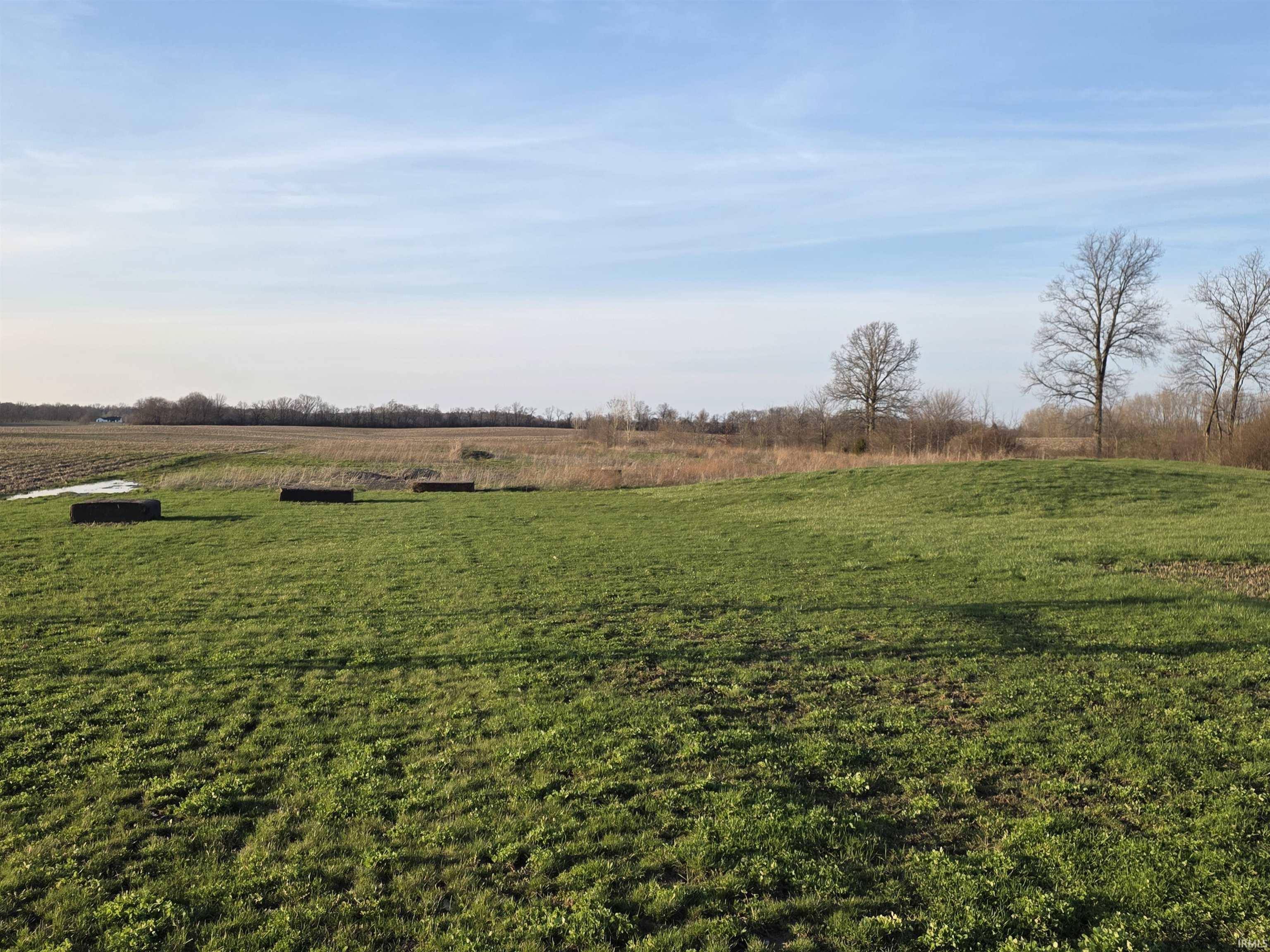 View of green lawn with a view of countryside