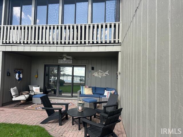 Patio / terrace featuring a ceiling fan, an outdoor lounge area, and a patio