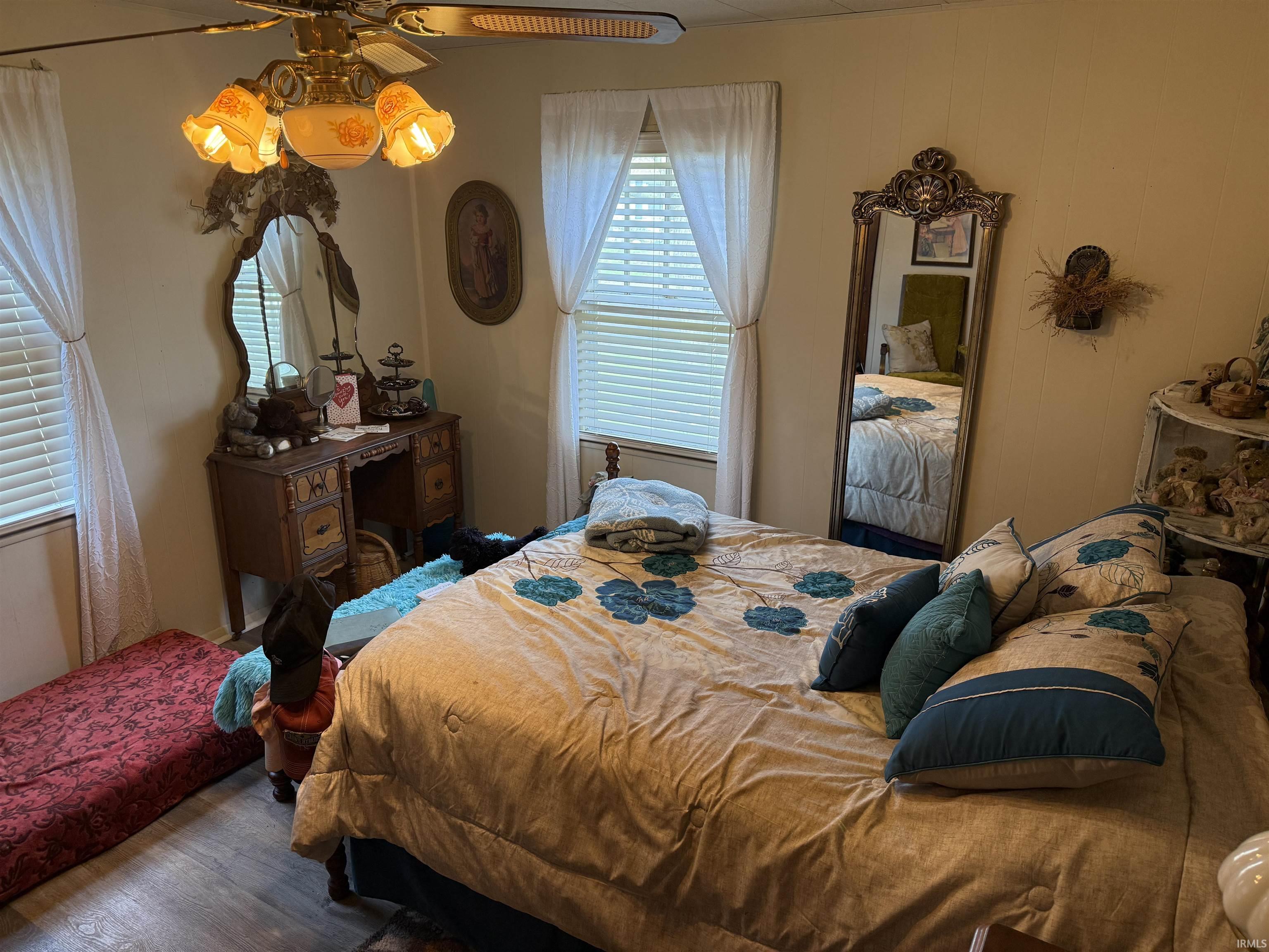 Bedroom with wood finished floors
