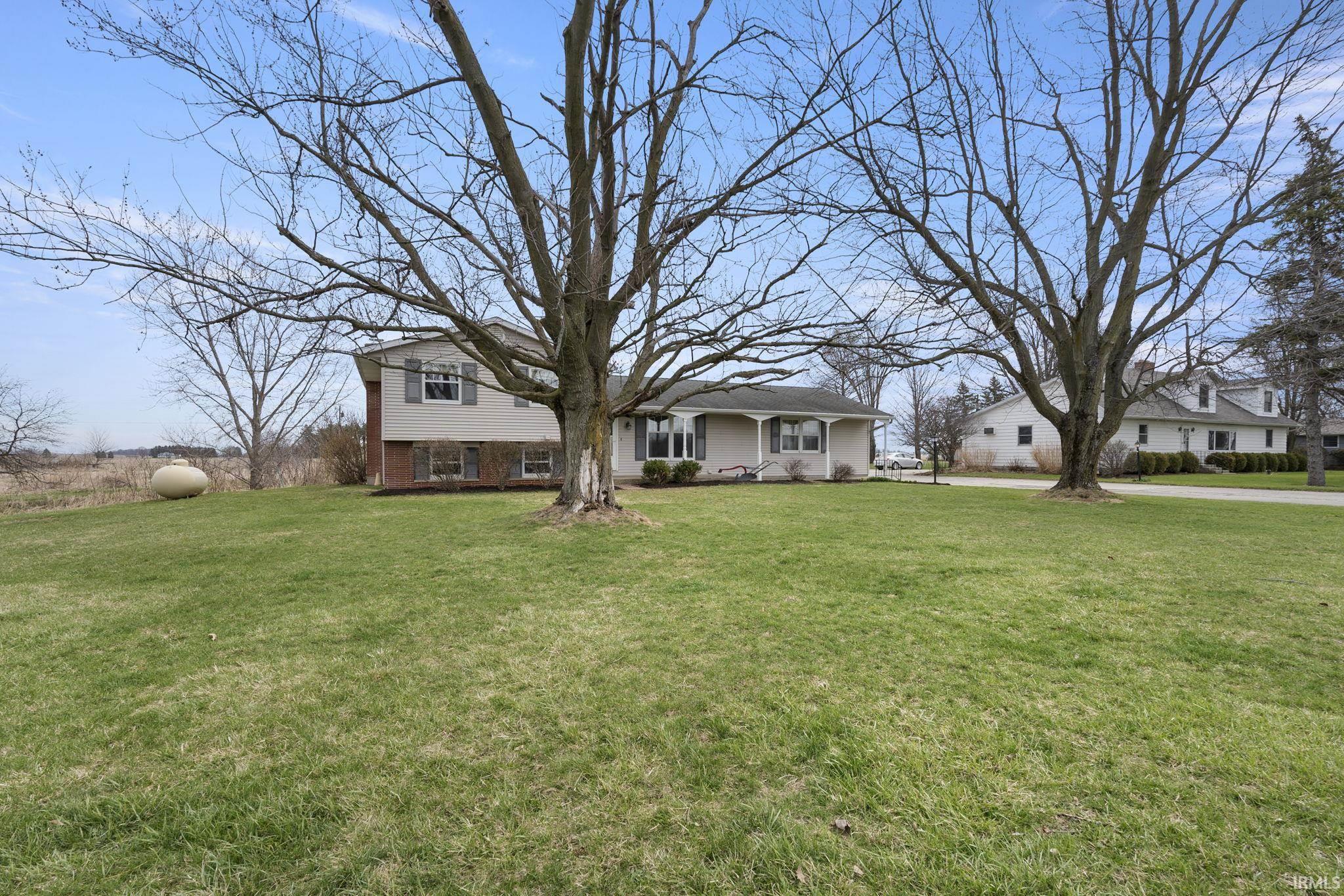 Quad-level home with a front lawn