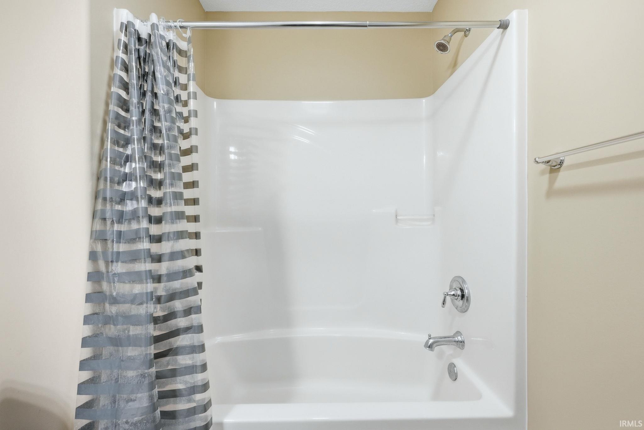 Bathroom featuring shower / tub combo