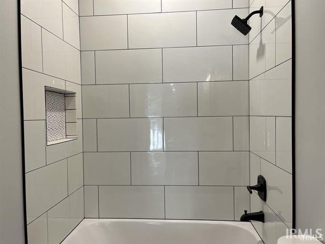 Bathroom featuring shower / tub combination
