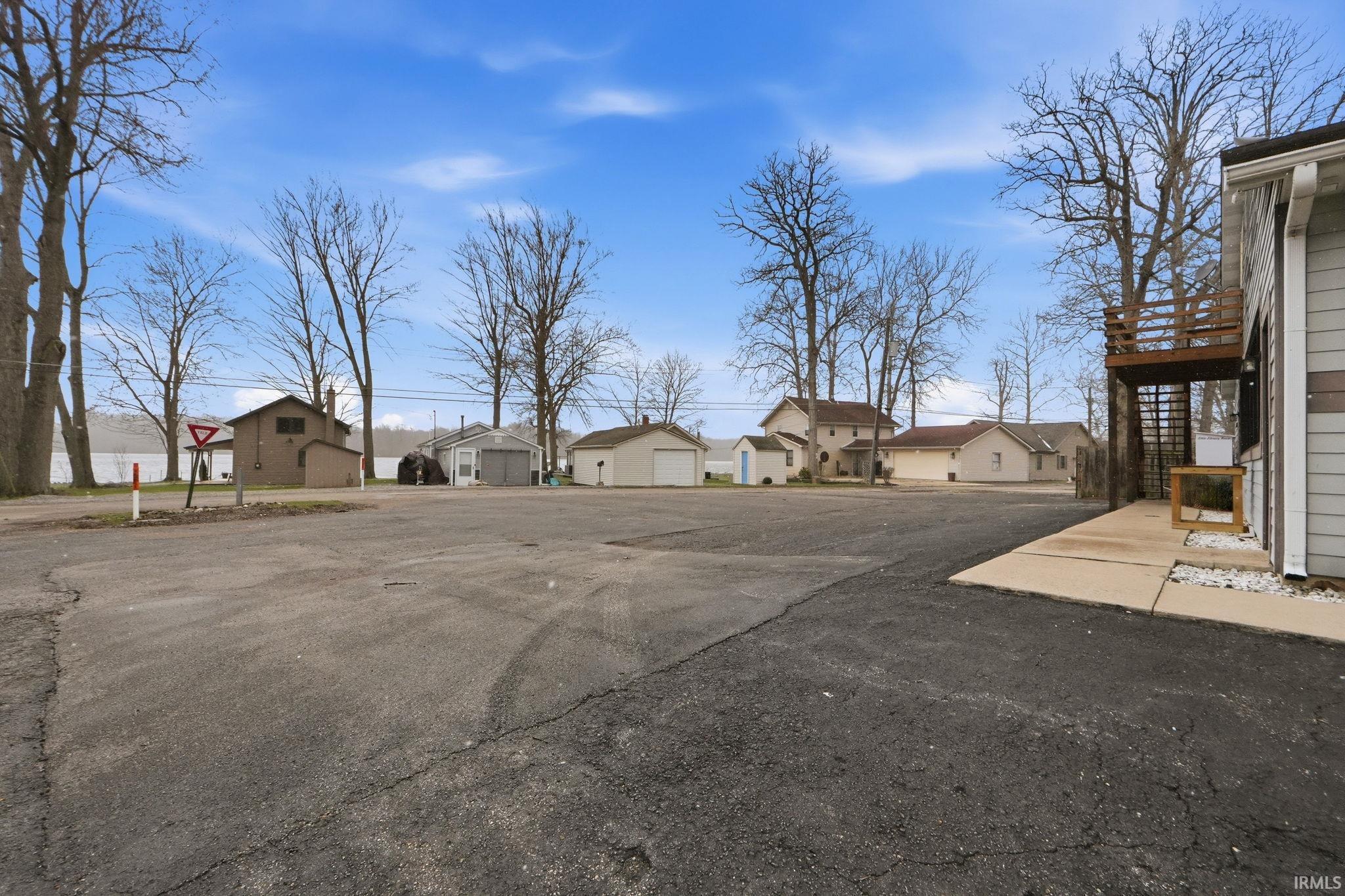 View of parking with a residential view