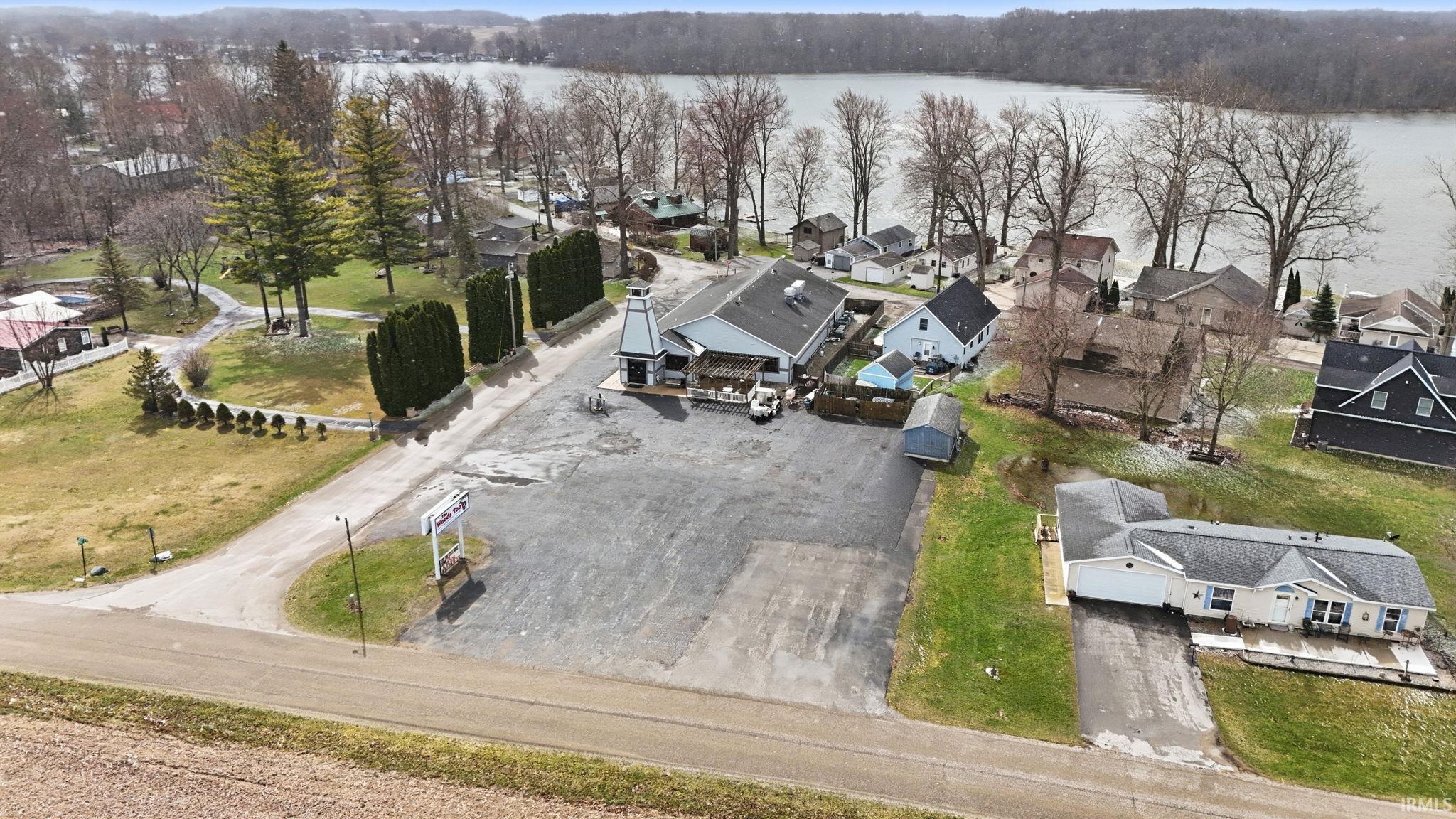 Aerial view of residential area with a large body of water
