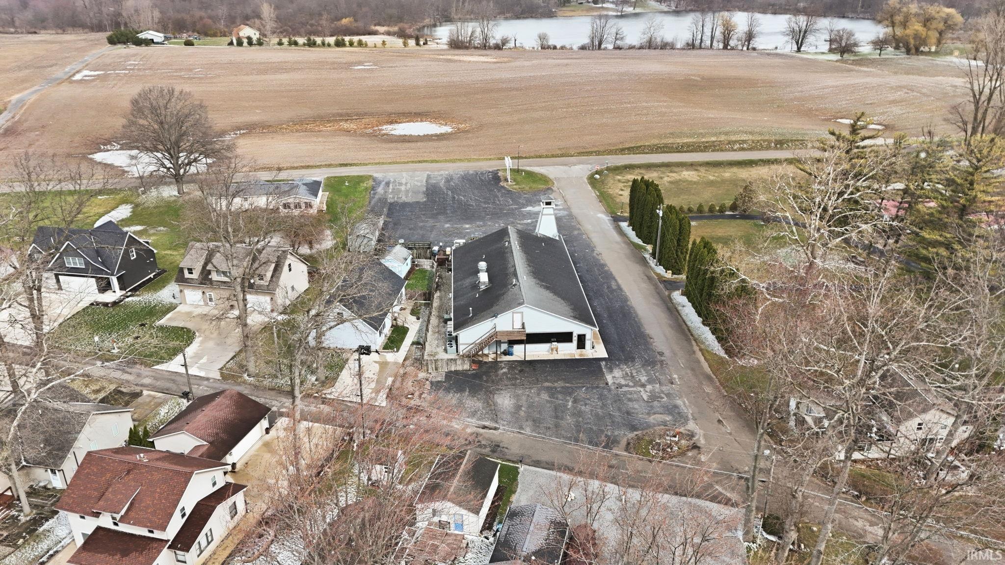 Aerial view of residential area with a nearby body of water