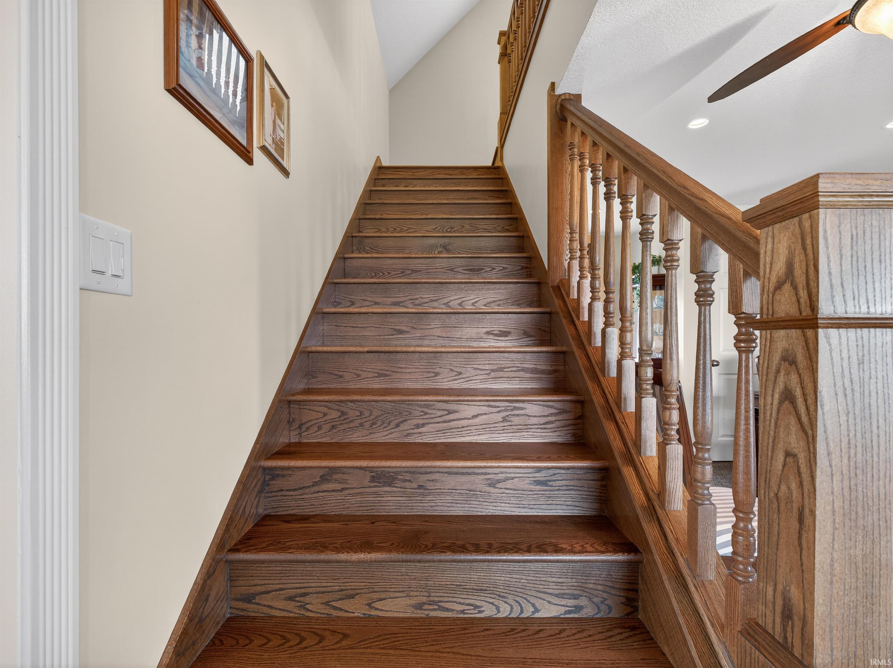Stairs with a ceiling fan