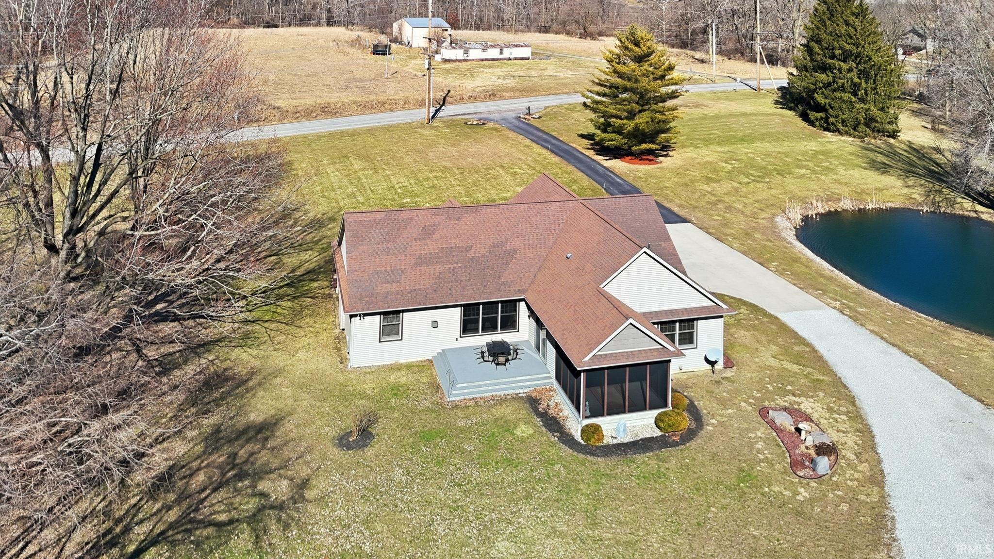 View of subject property with a nearby body of water