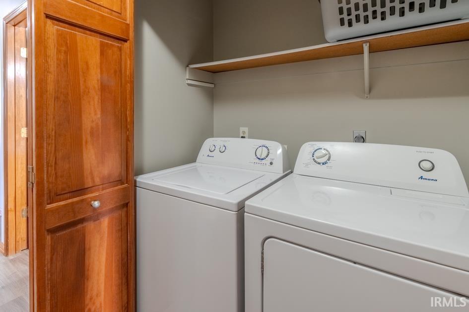 Laundry area with separate washer and dryer