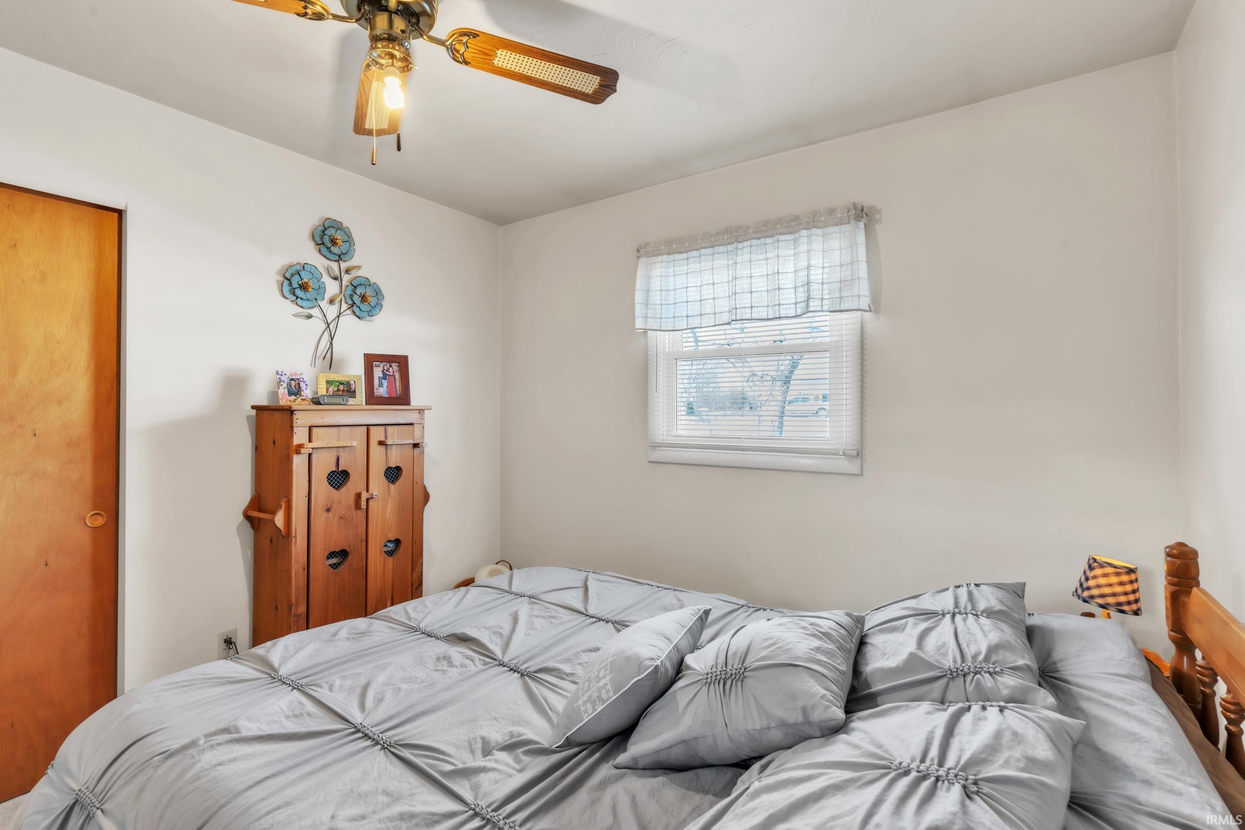 Bedroom with a ceiling fan
