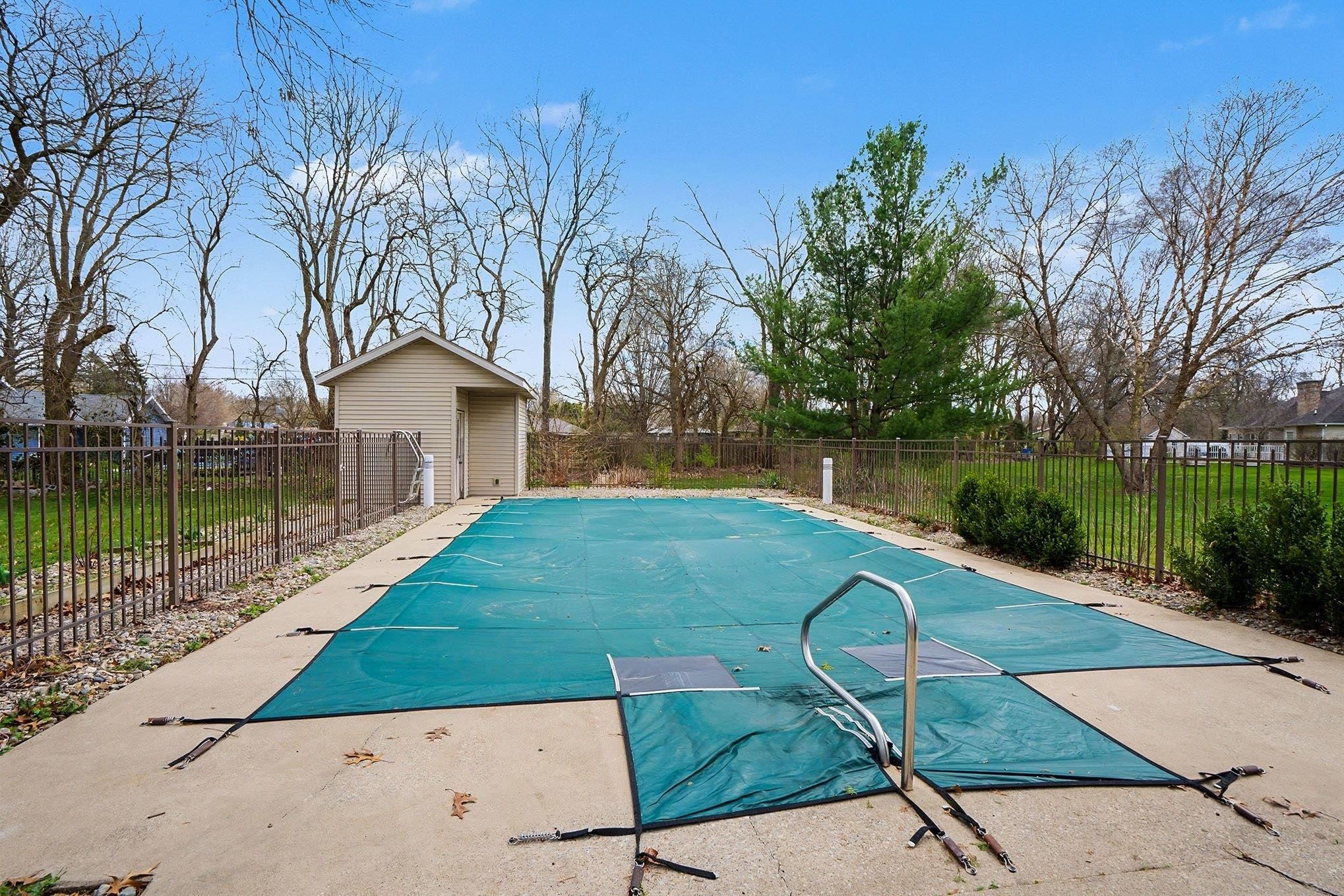 View of swimming pool featuring patio surround