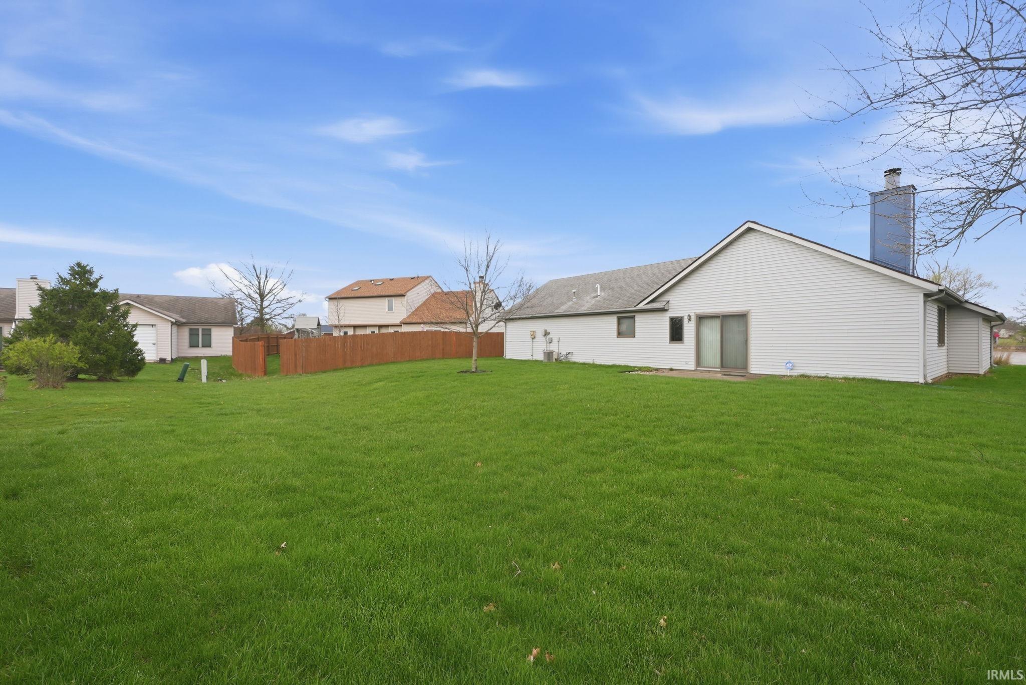 Back of property with a chimney