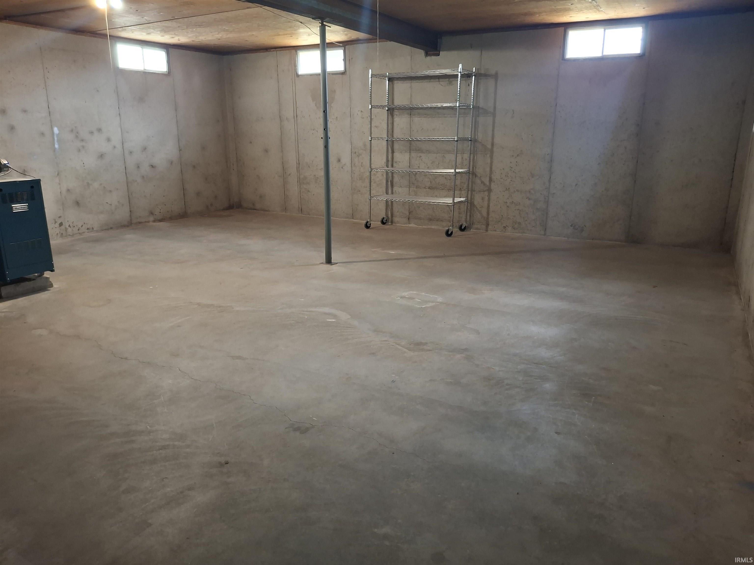 Below grade area with a heating unit