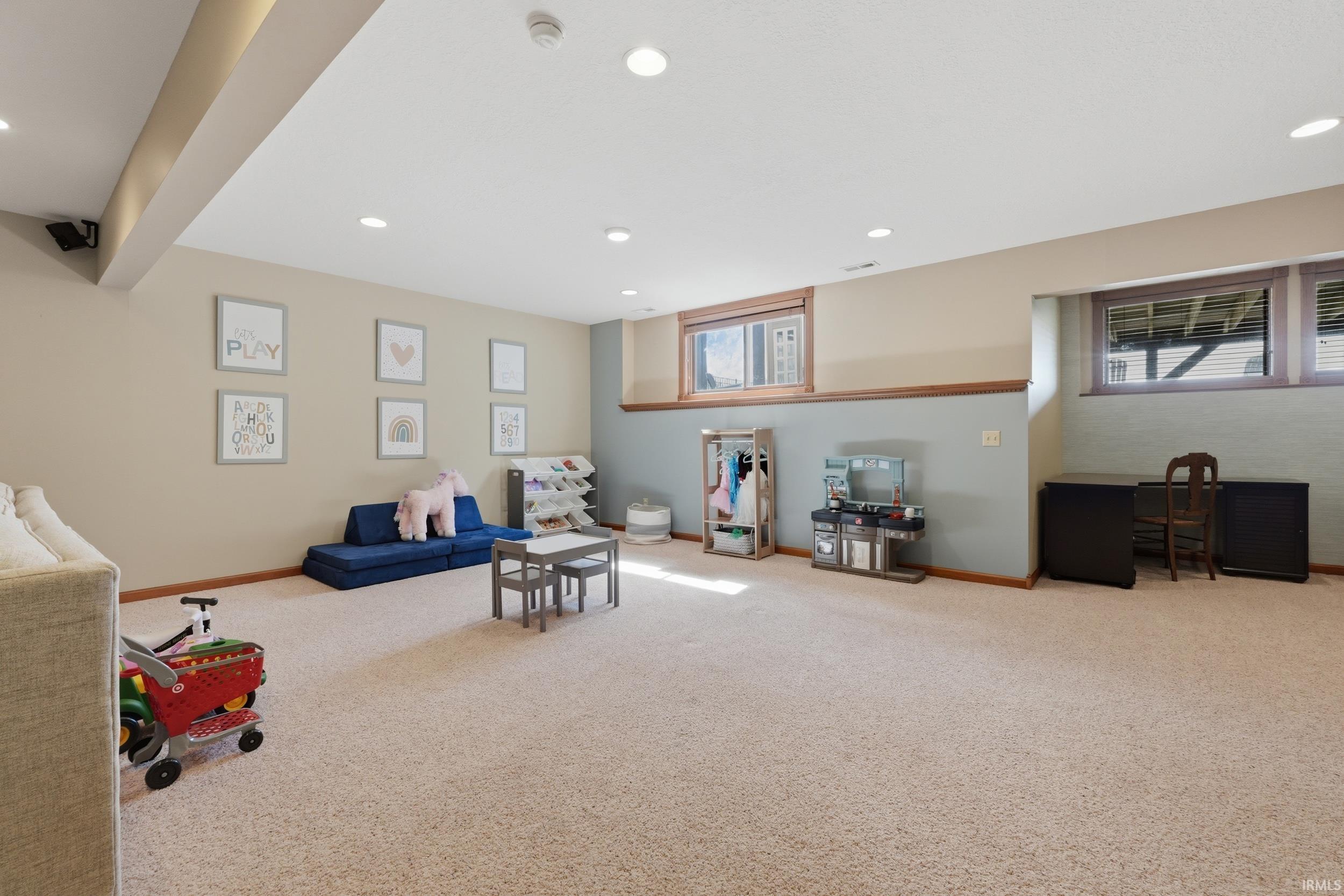 Playroom with carpet flooring and recessed lighting