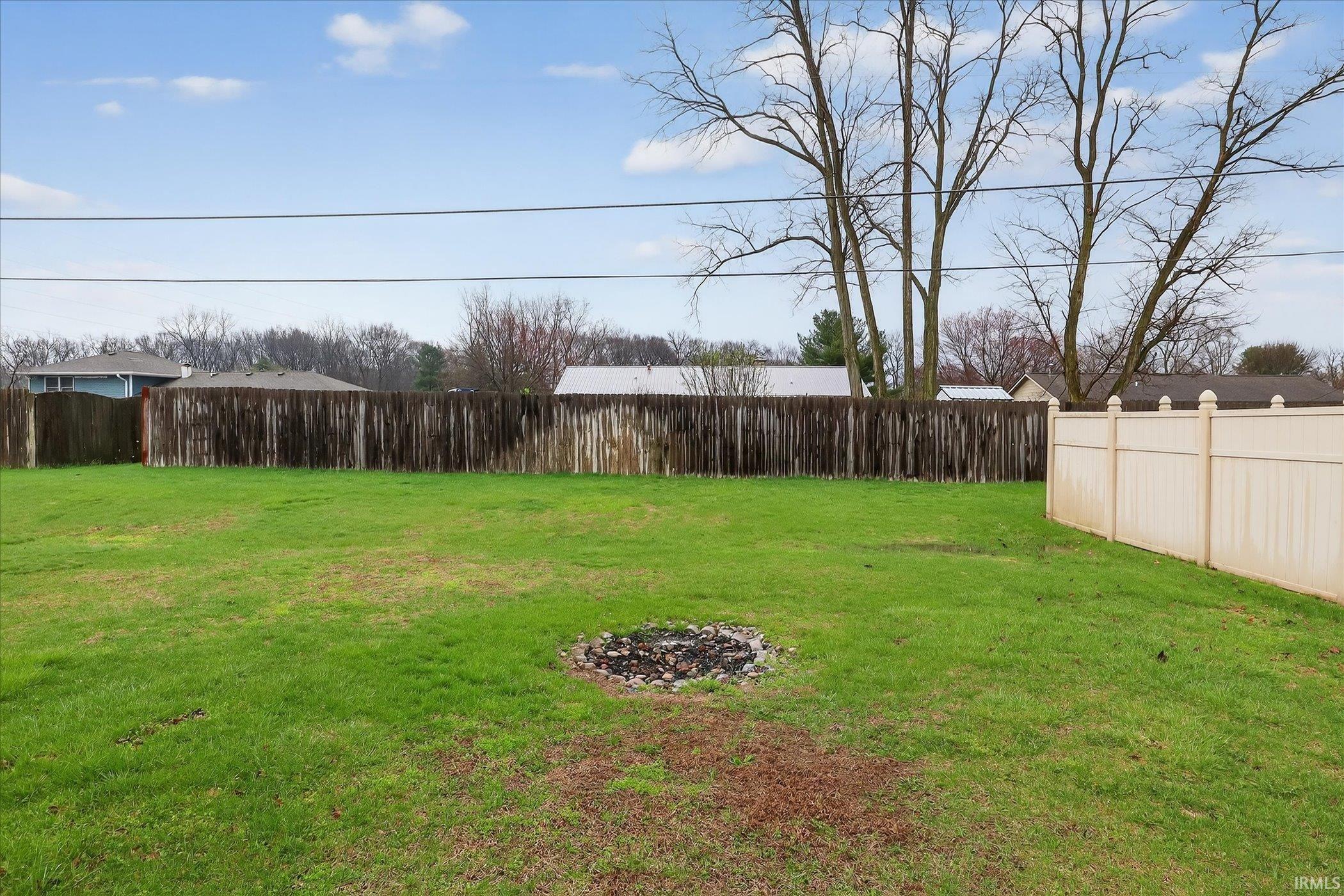 View of fenced backyard