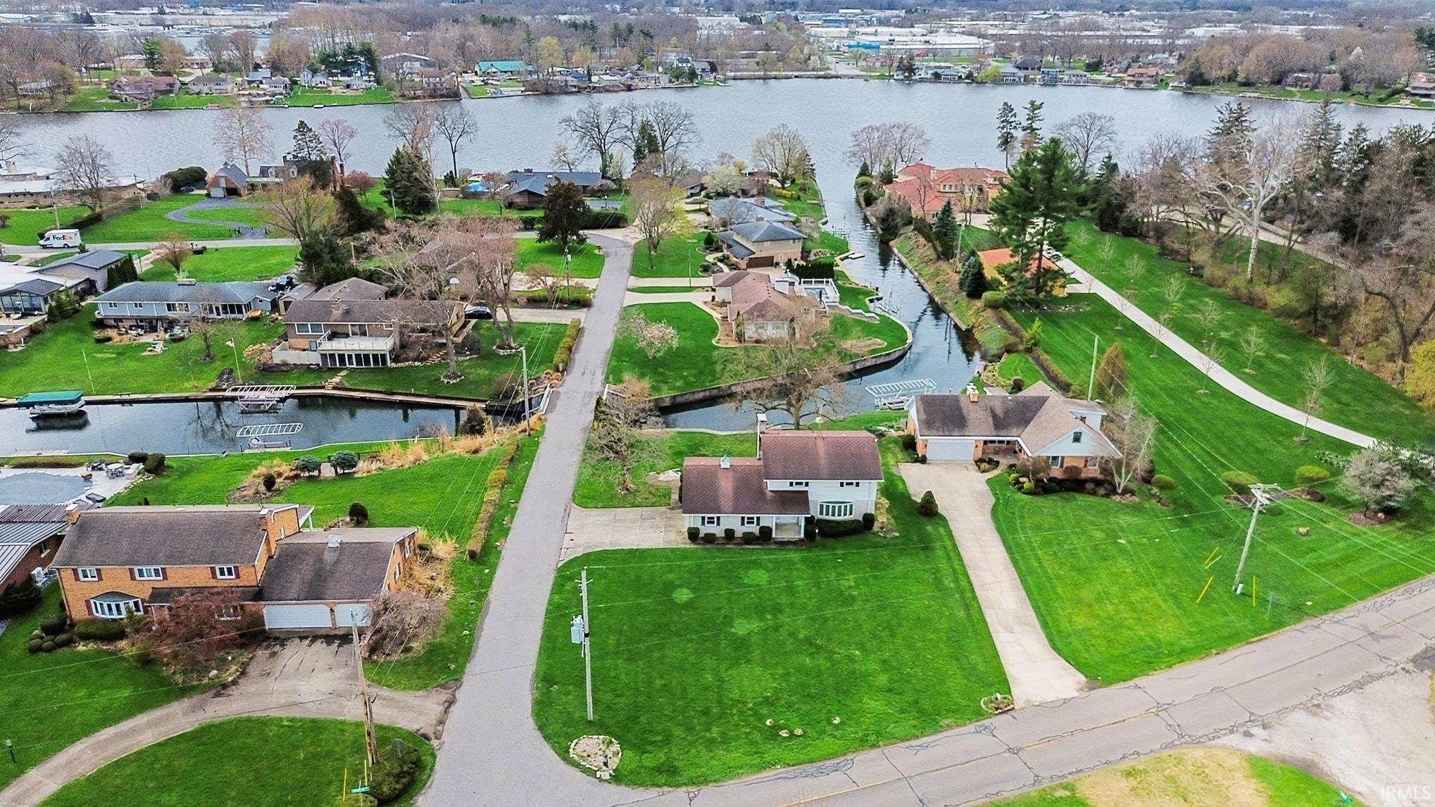 Aerial view of residential area with a nearby body of water