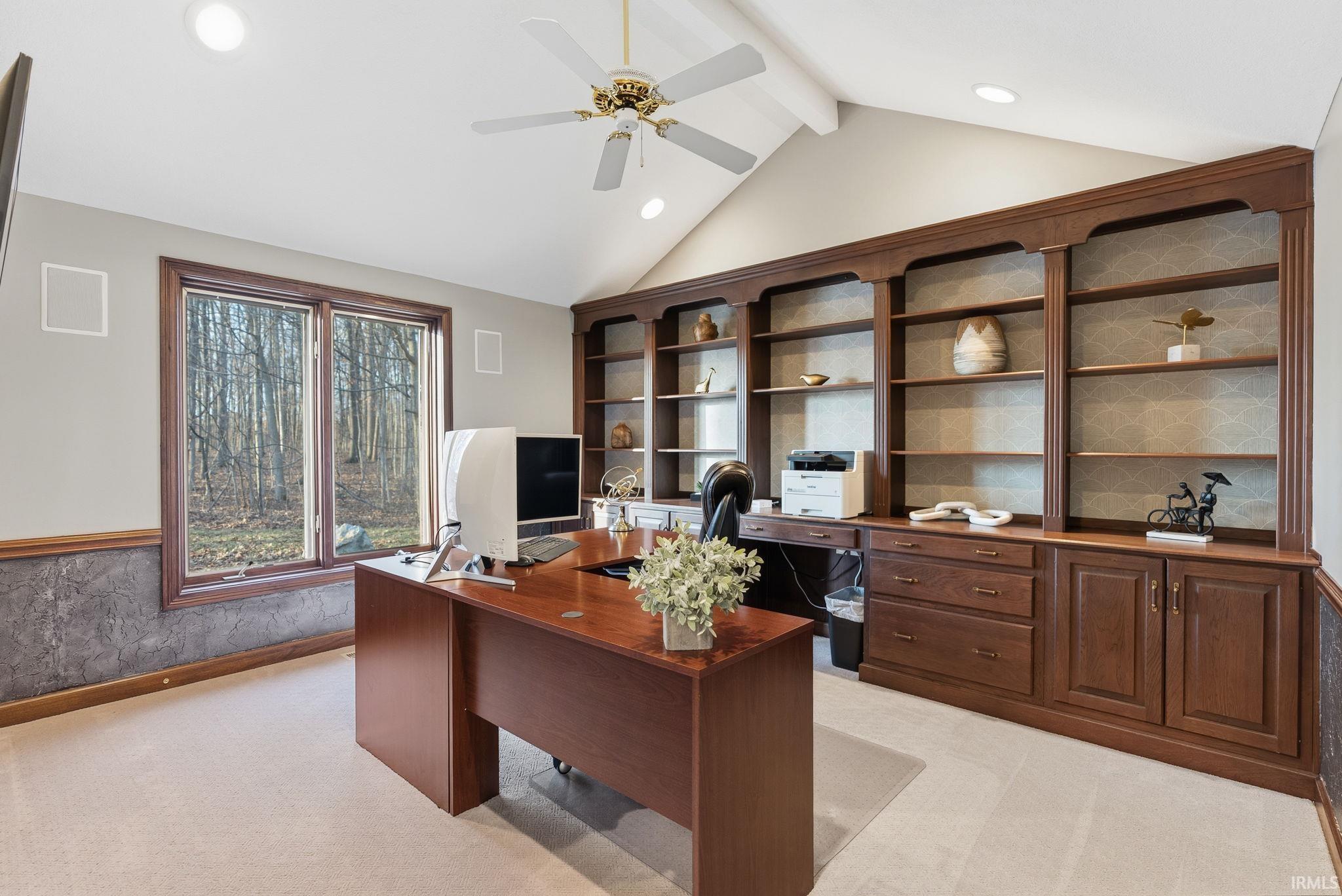 Home office with light carpet, a ceiling fan, recessed lighting, and beamed ceiling