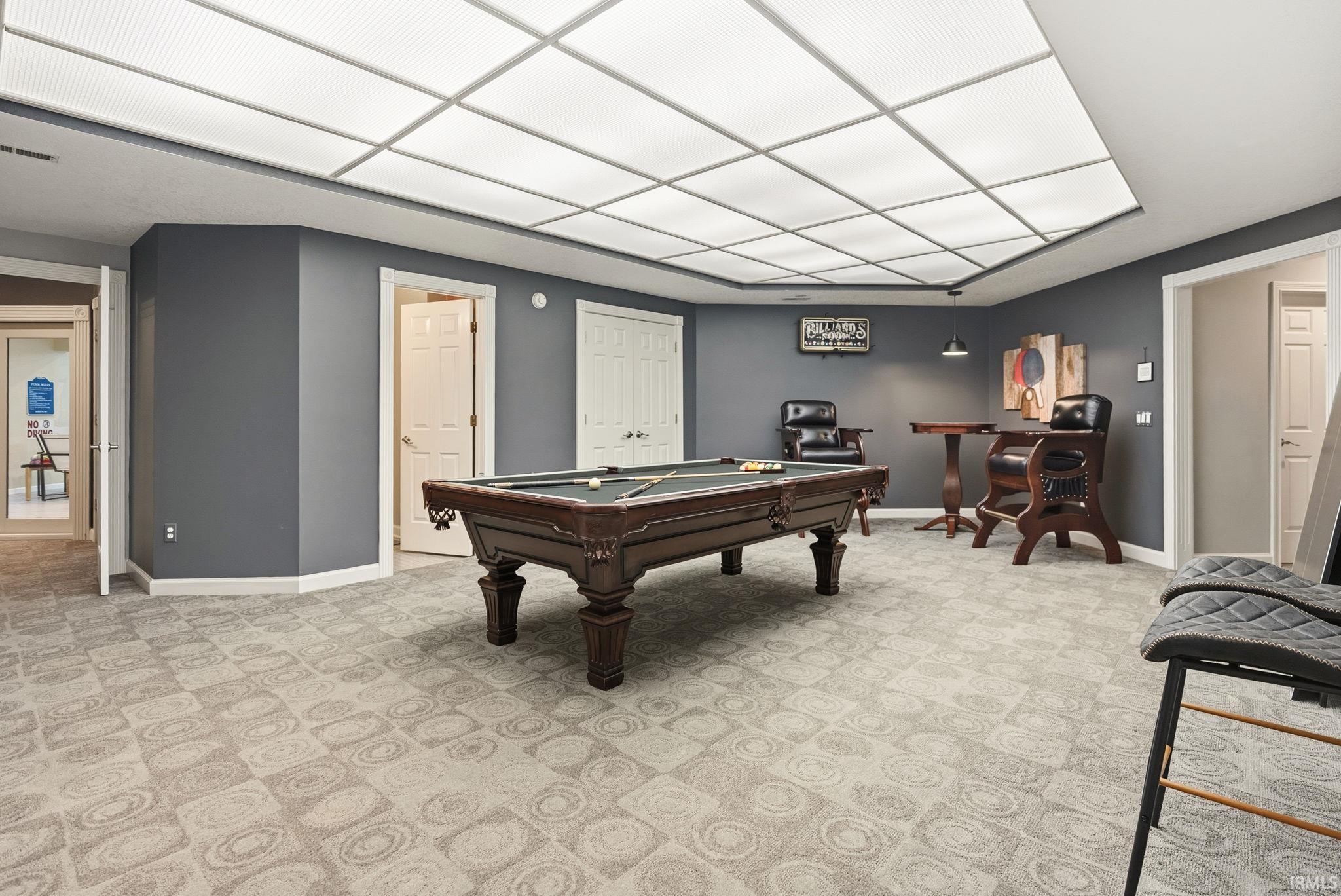 Rec room featuring billiards and light colored carpet