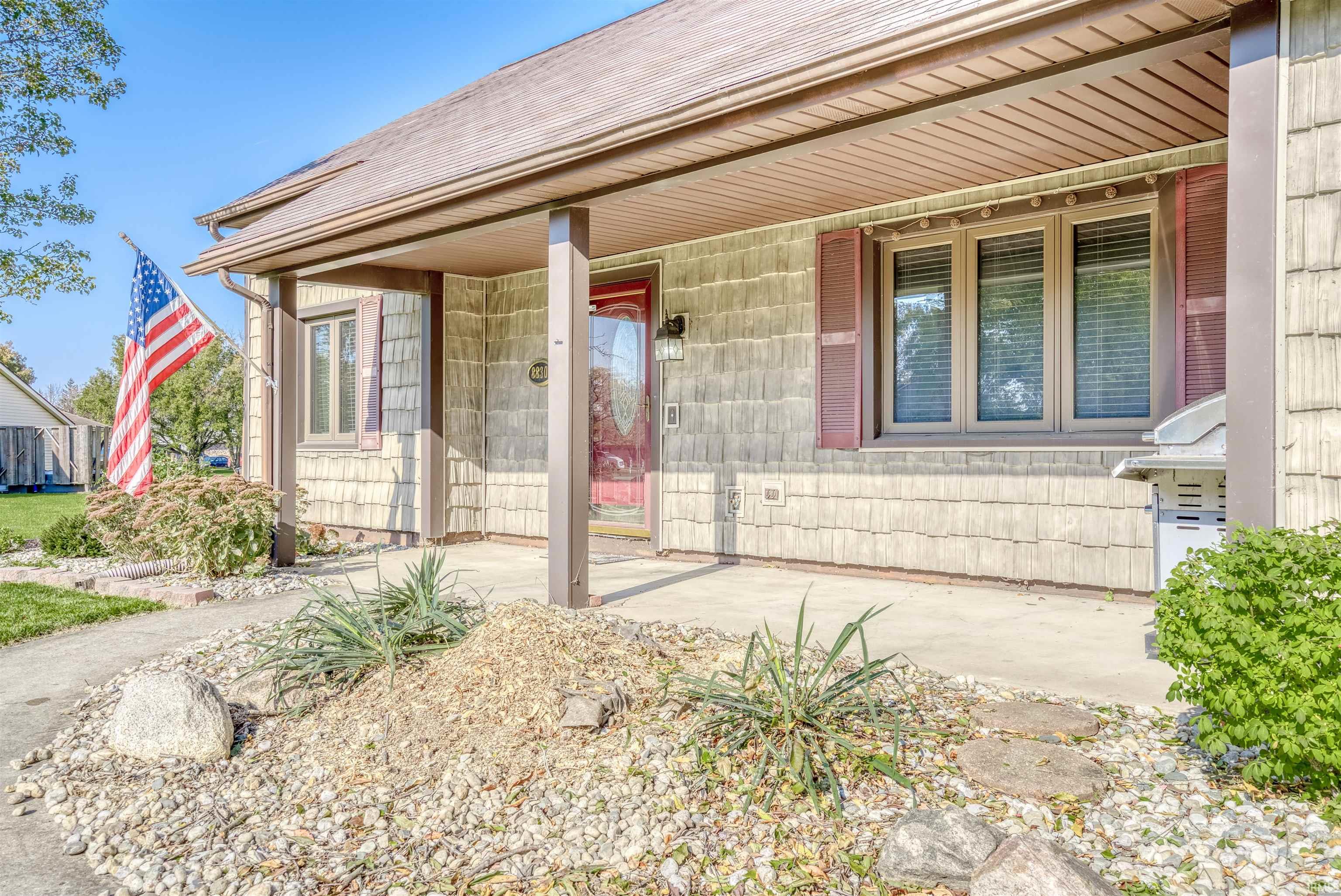 Entrance to property with a porch