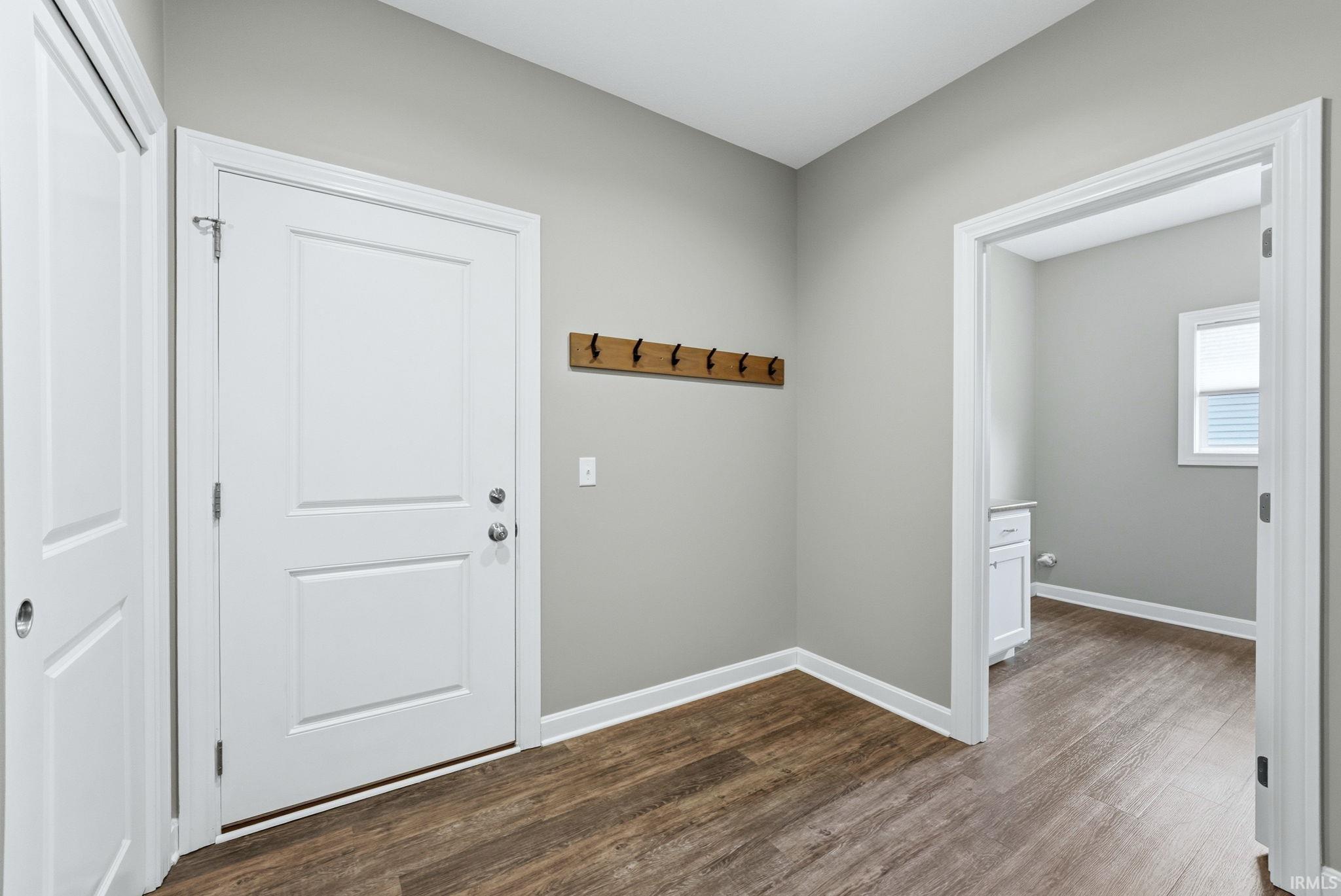 Doorway with wood finished floors