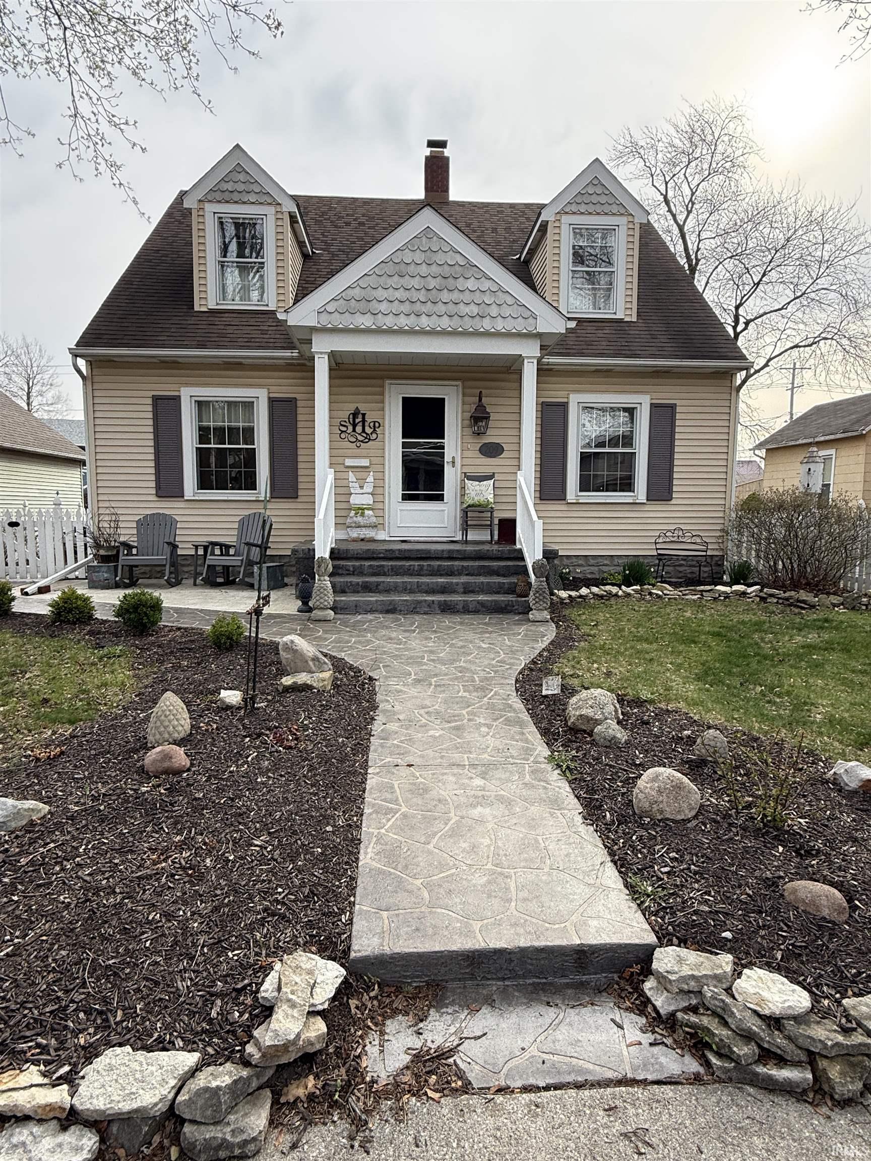 Don't miss your chance at this charming 2 story home with excellent curb appeal and character throughout the home. This home features 3 bedrooms and 2 full baths with tons of space and thoughtful updates! The full basement includes an additional shower and provides plenty of storage! Brand new water heater (2025) and newer sump pump (2021). The home comes fully equipped with washer, dryer, stove, microwave, and dishwasher! Outside you will find a beautiful patio with stamped concreate and a nice 2 1/2 car garage that offers office space and a covered porch to relax in the evenings!  Selling Subject to Finding Suitable Housing.