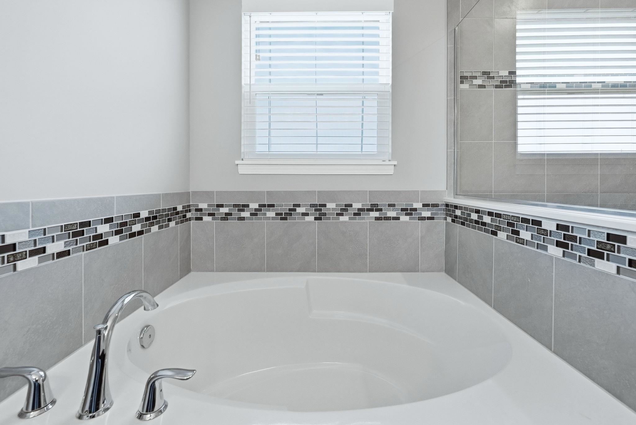 Bathroom featuring a garden tub
