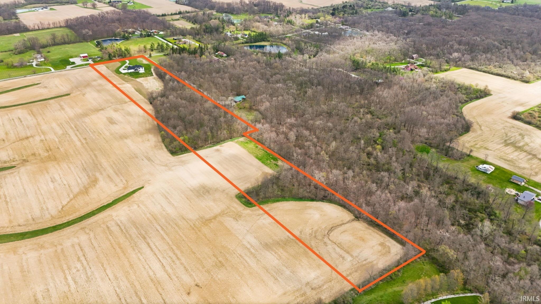 Overview of rural landscape featuring property parcel outlined