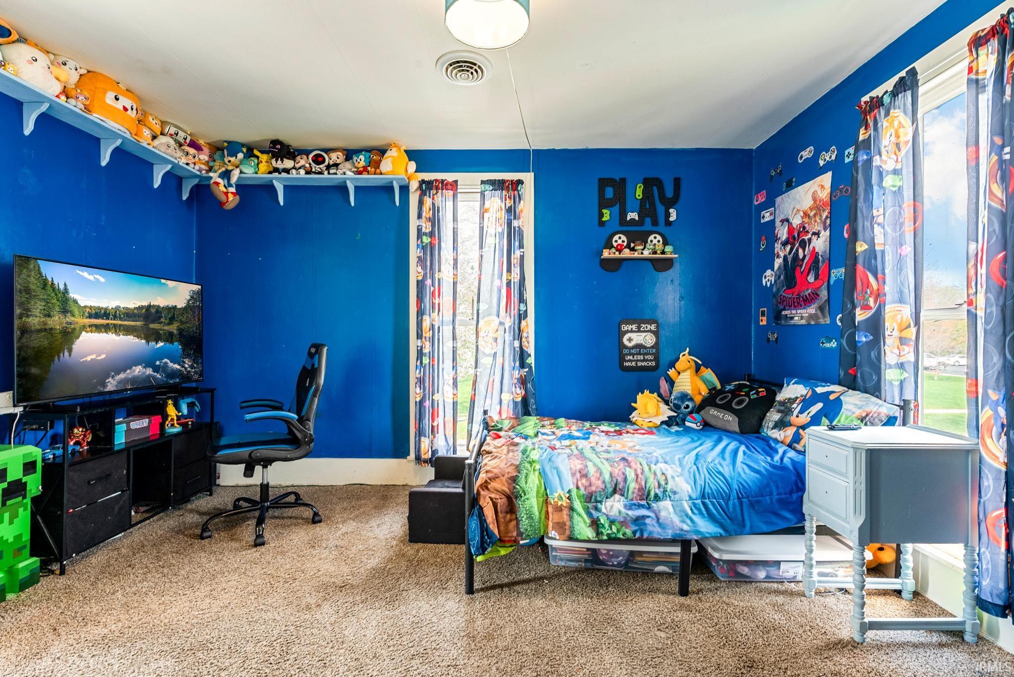 Bedroom featuring carpet
