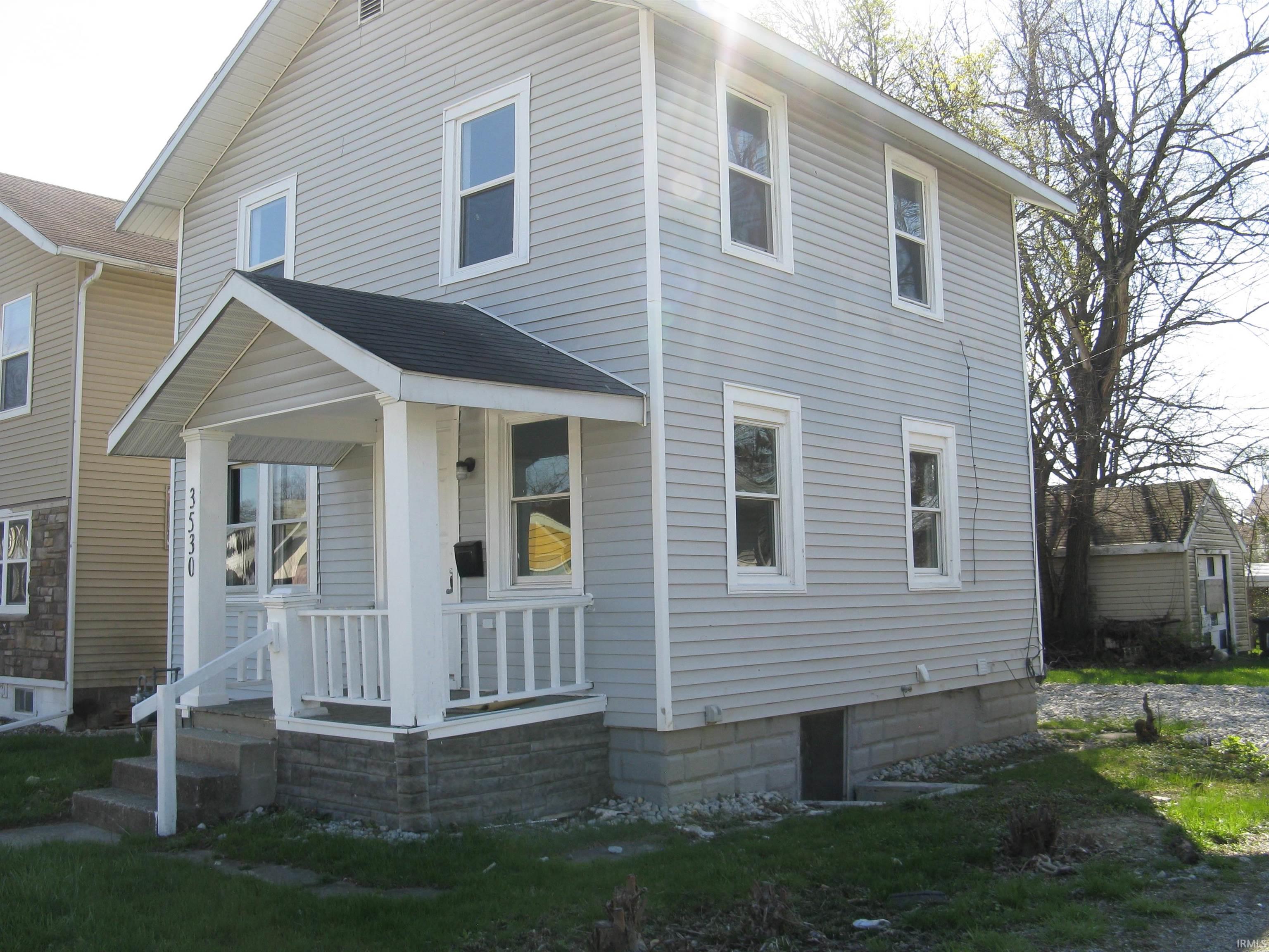 View of front of home with covered porch