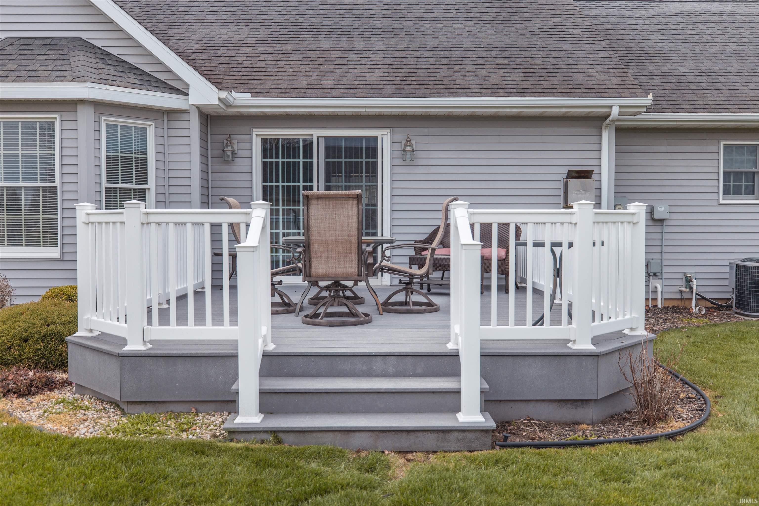 Wooden deck featuring outdoor dining space