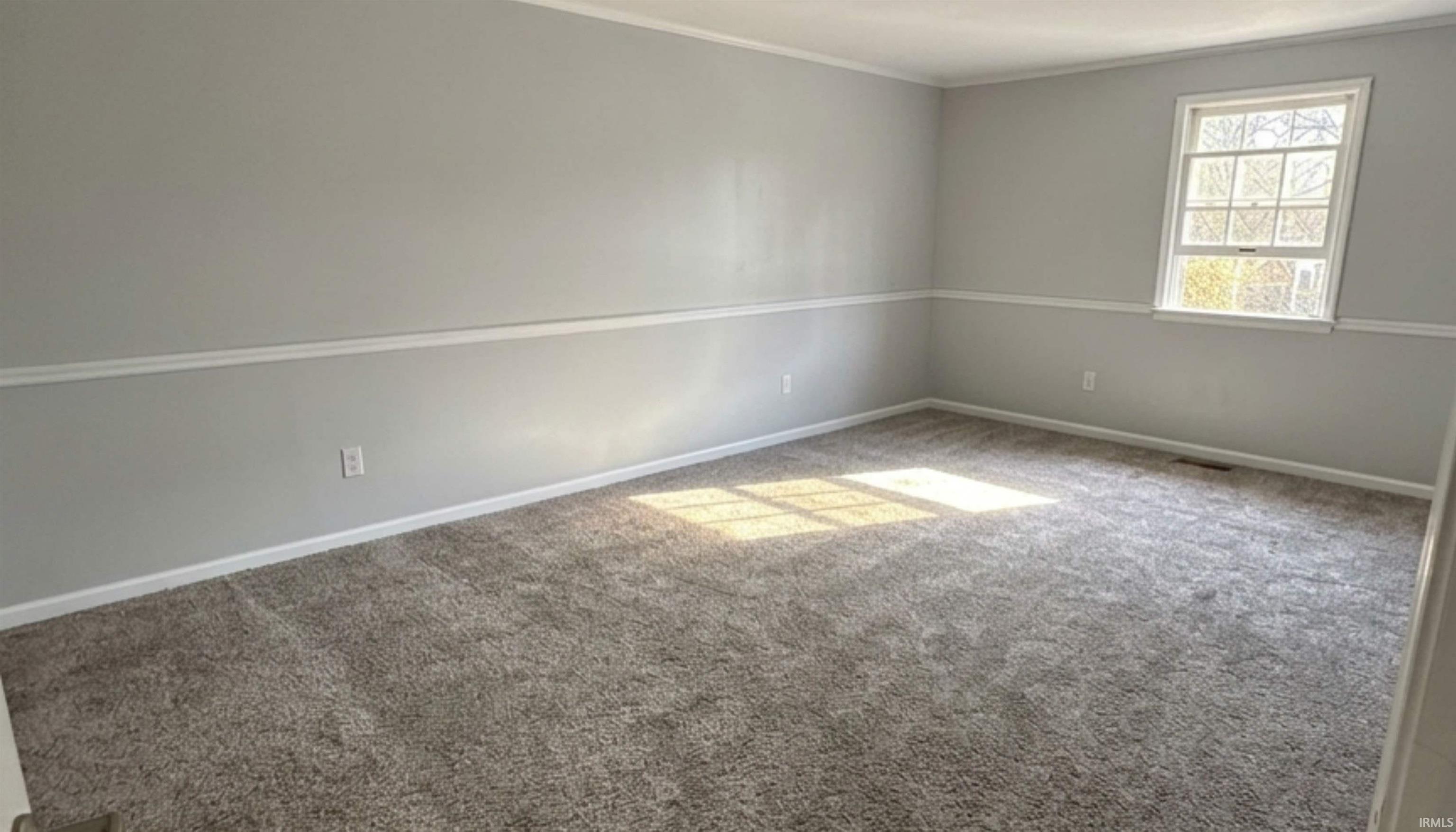 Master bedroom with walk-in closet and full bathroom. (AI Generated staging)