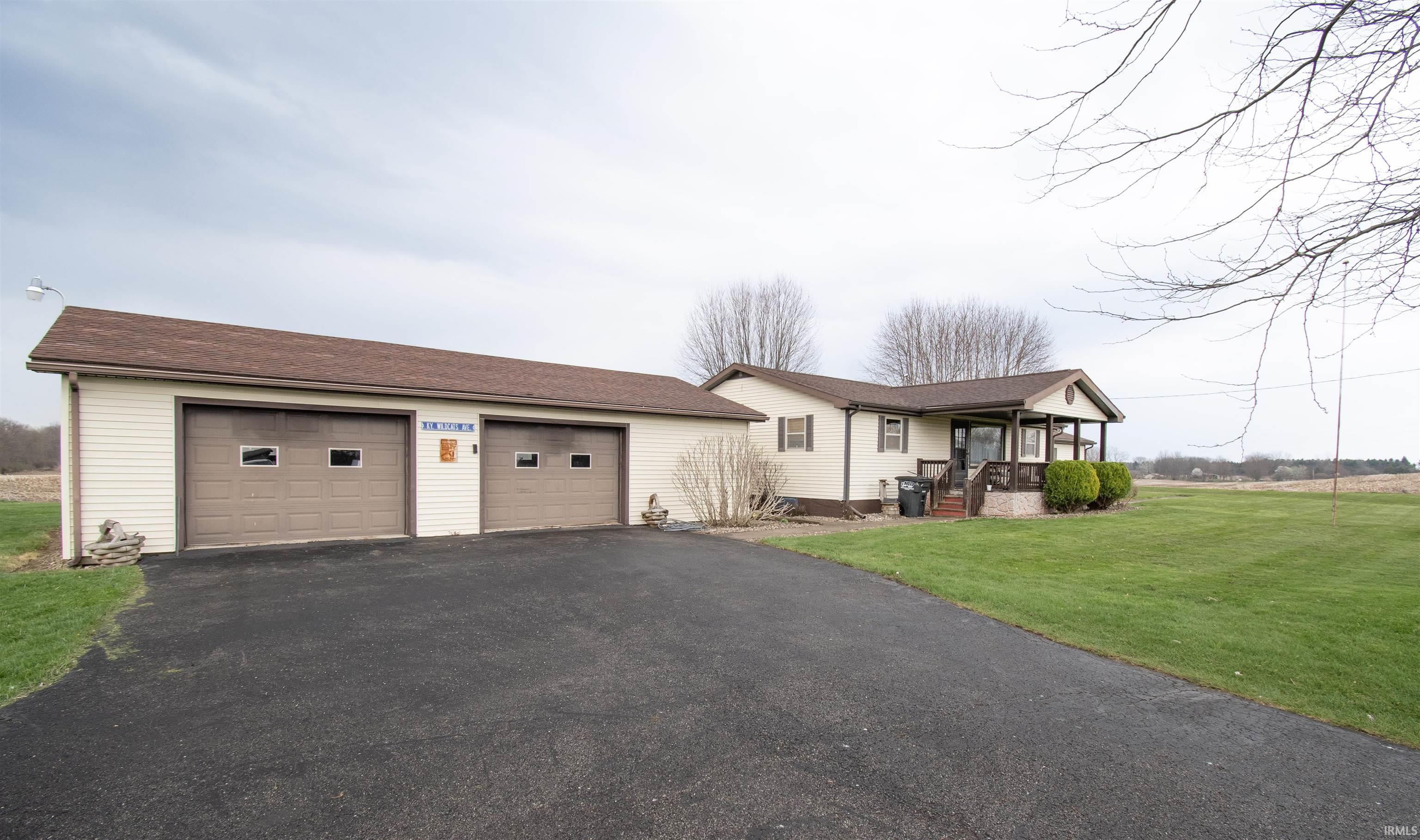 View of front of property with a front lawn