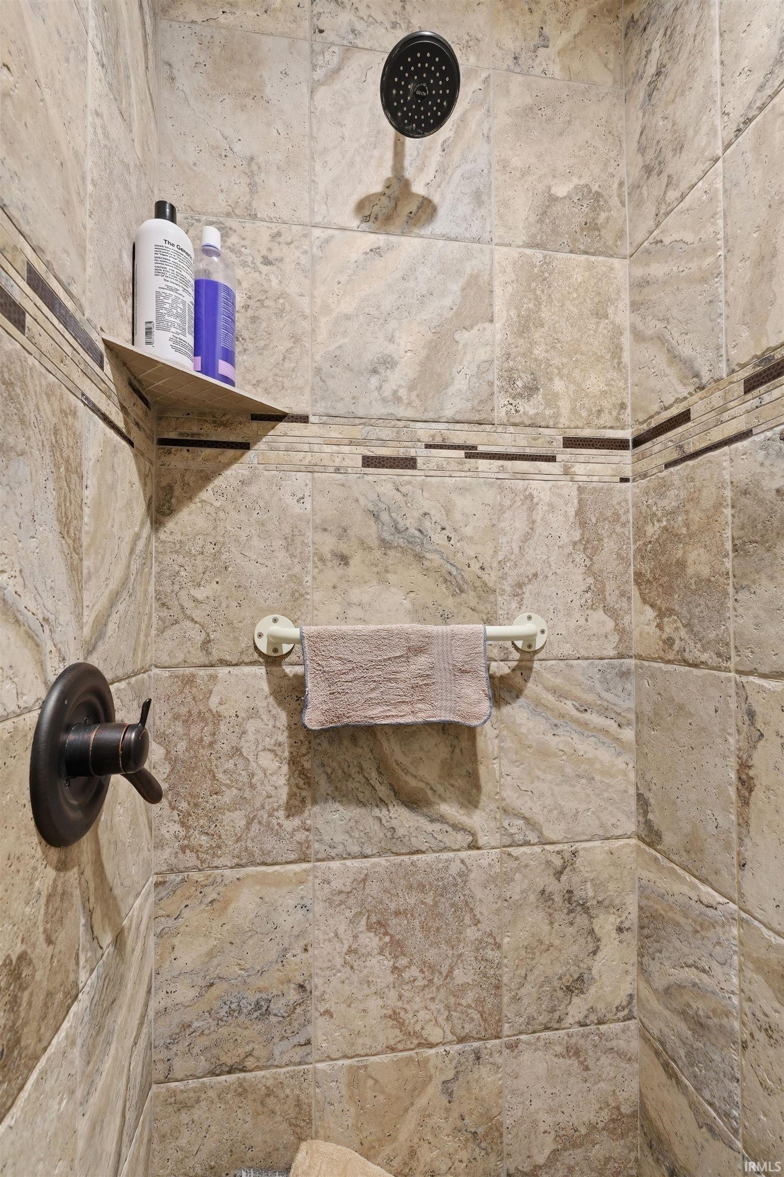 Bathroom view of tiled shower
