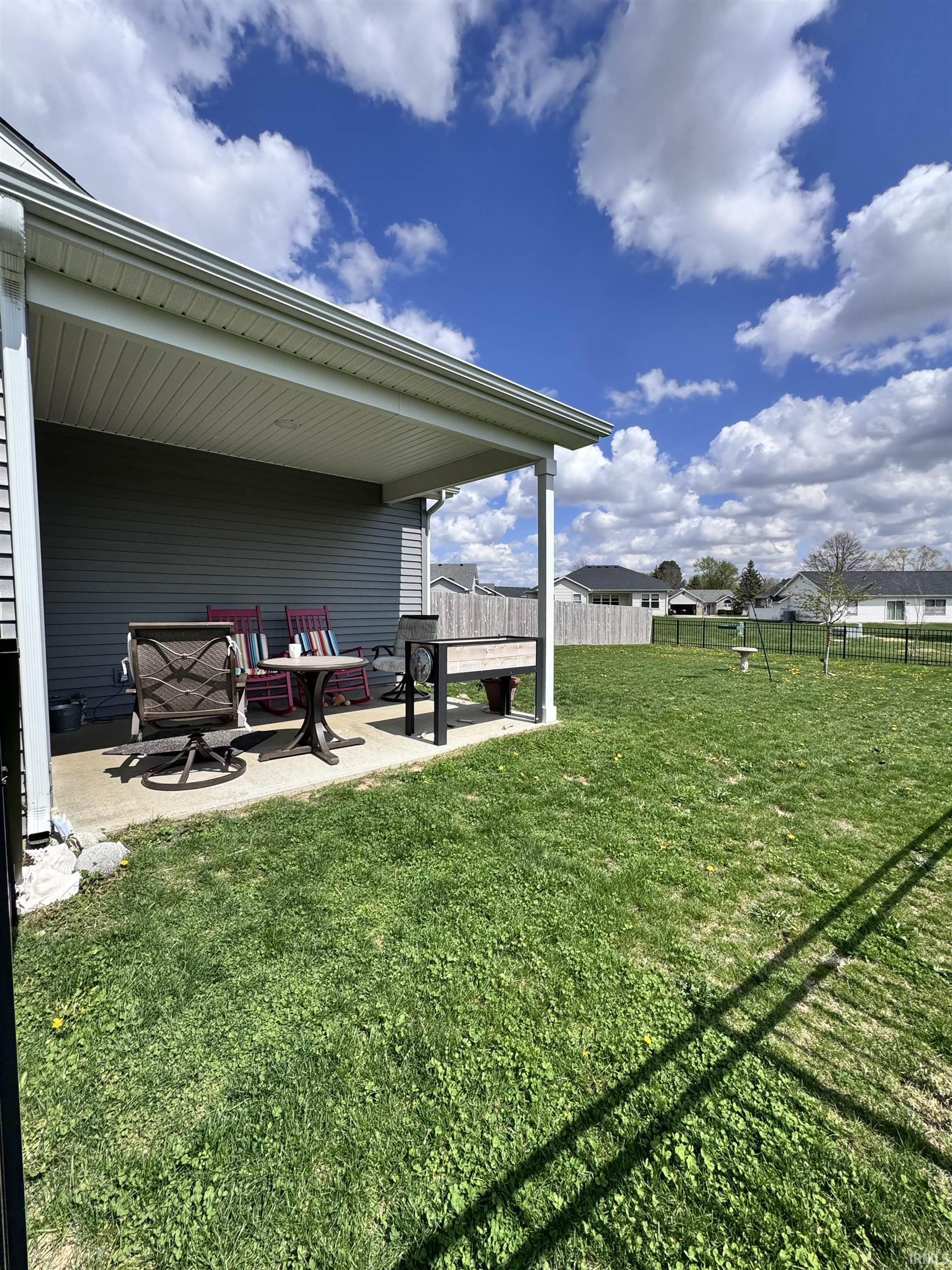 View of yard with a patio