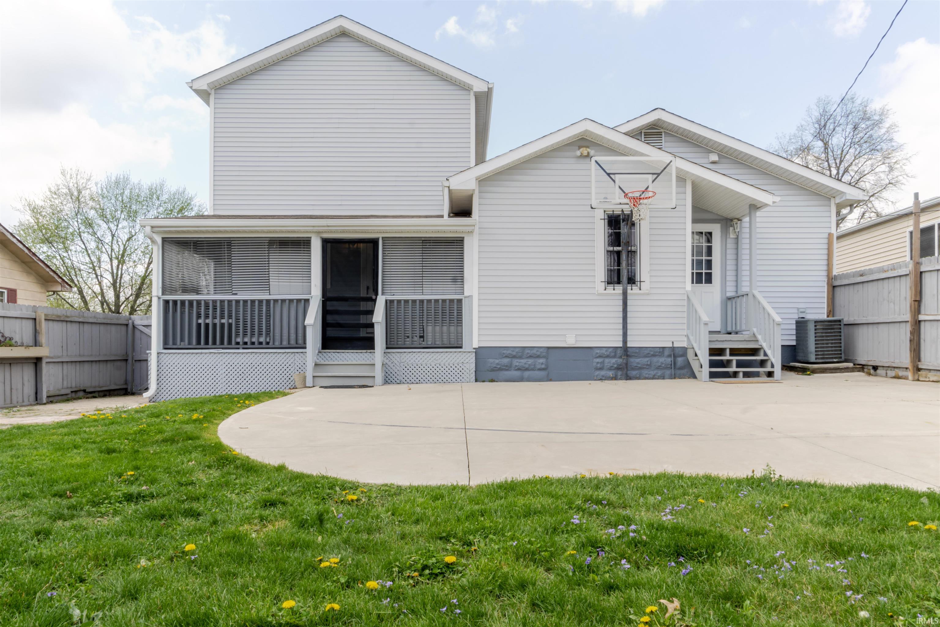 Back of property with entry steps