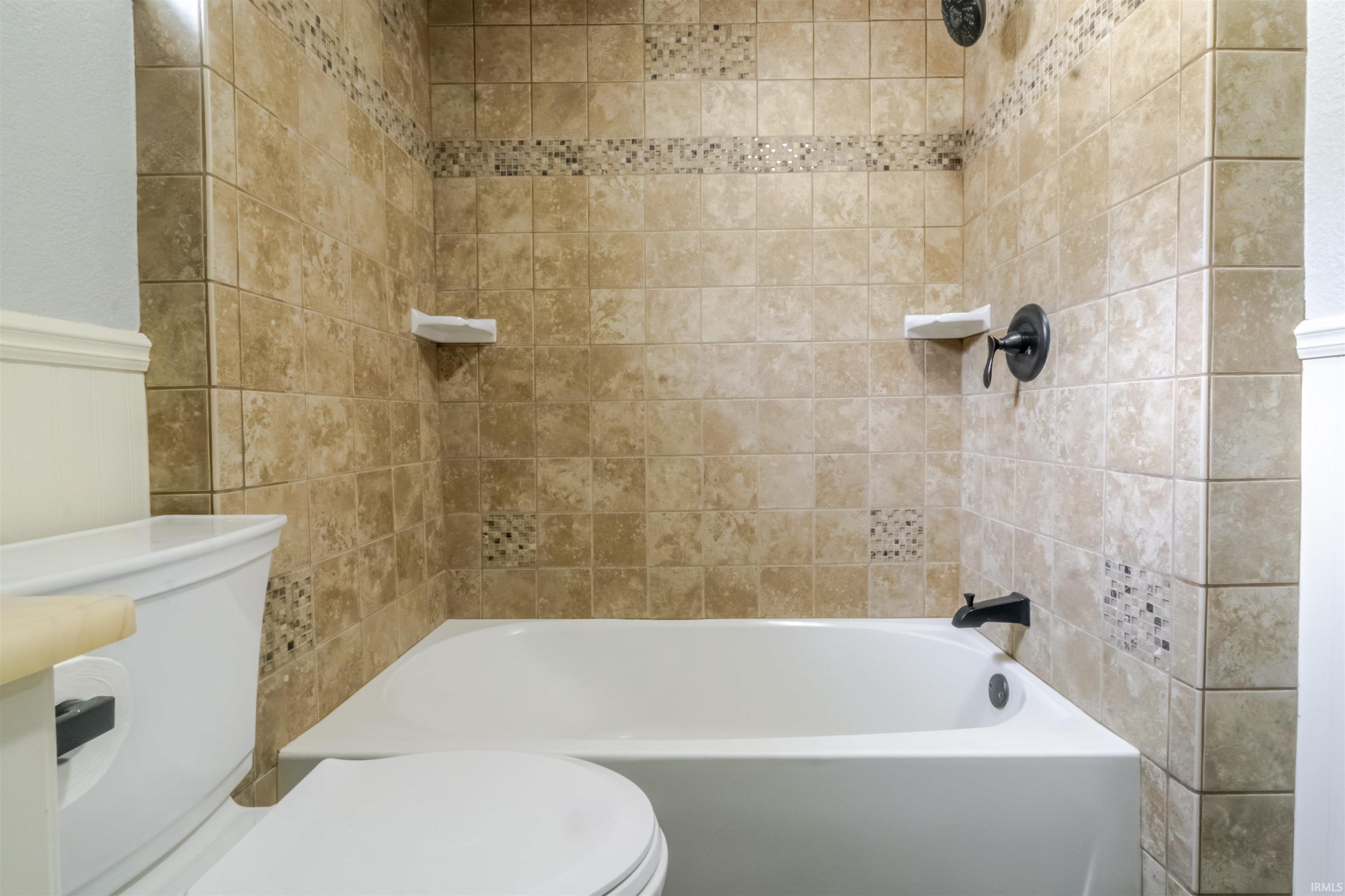Bathroom featuring  shower combination