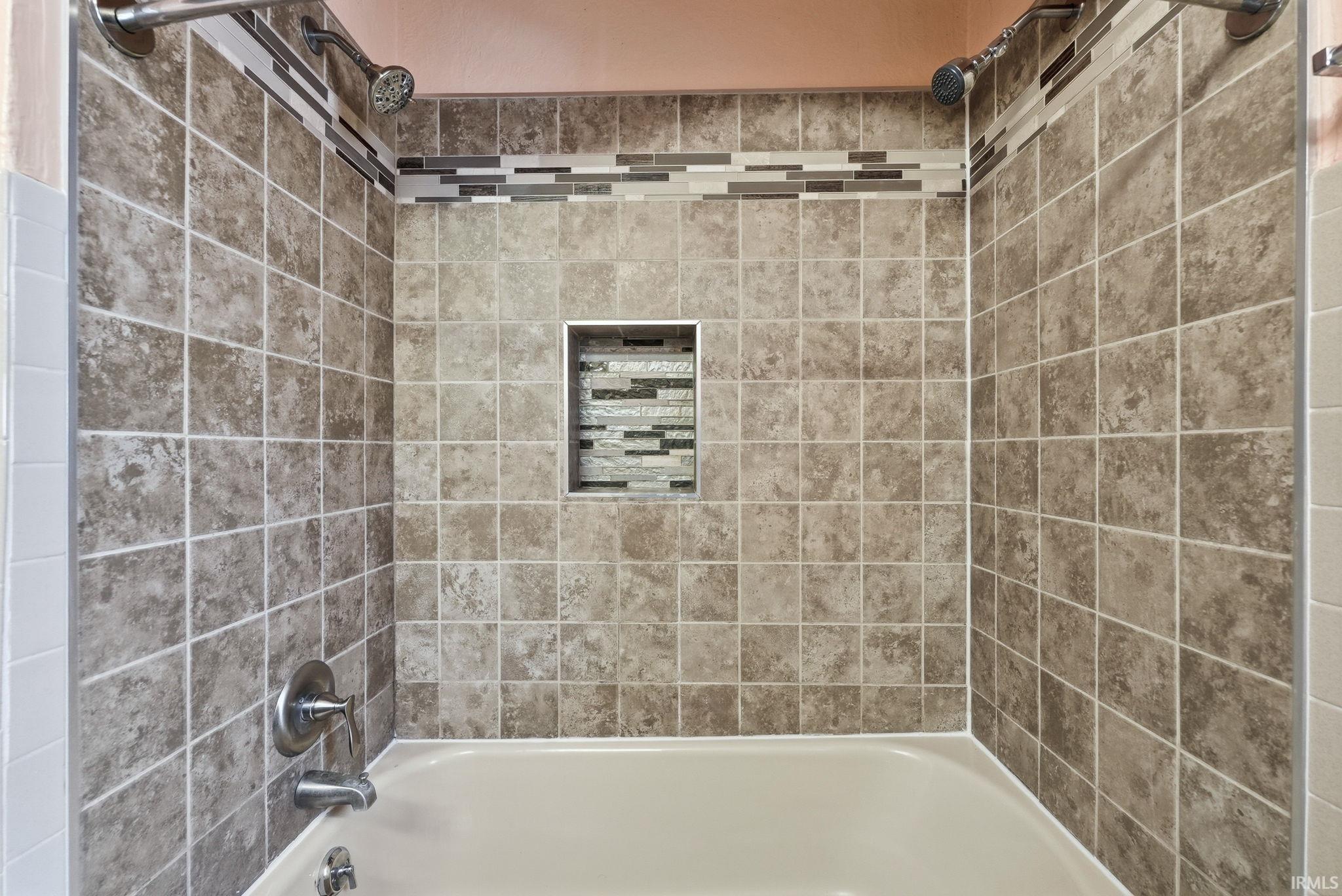 Full bath featuring  shower combination